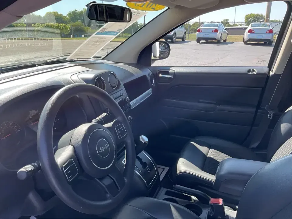 2015 Jeep Compass Altitude Edition (1C4NJCBA6FD) with an 2L I-4 DOHC engine, Continuously Variable Transmission (CVT) transmission, located at 8750 N County Rd 25A, Piqua, OH, 45356, (937) 908-9800, 40.164391, -84.232513 - **Adventure Awaits in the 2015 Jeep Compass Altitude Edition at Advantage Car and Credit - Fairborn!**<br /> <br /> Are you ready for your next adventure? The 2015 Jeep Compass Altitude Edition is your perfect companion for weekend getaways, family road trips, or even your daily commute! This versat - Photo#9