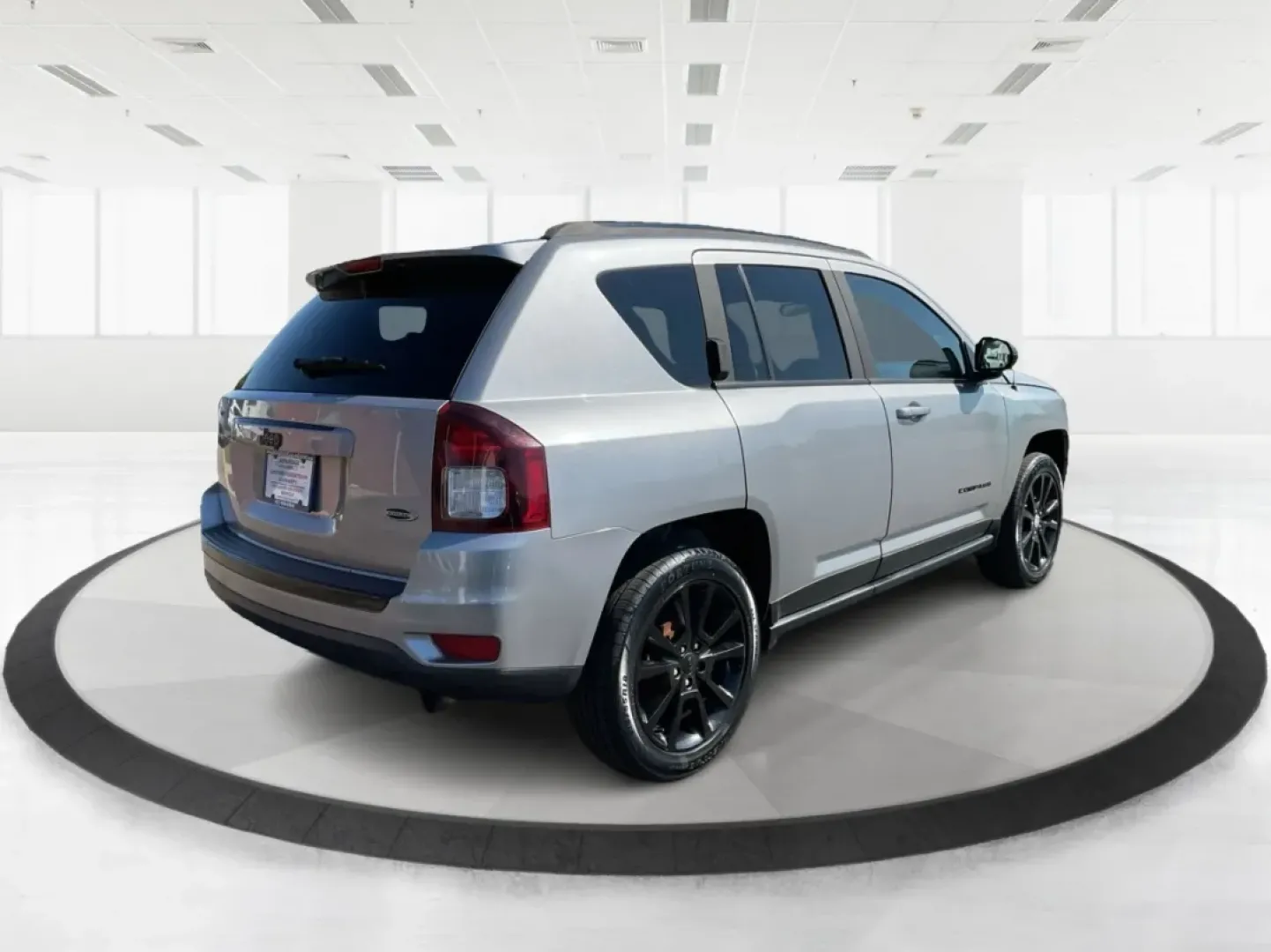 2015 Jeep Compass Altitude Edition (1C4NJCBA6FD) with an 2L I-4 DOHC engine, located at 1184 Kauffman Ave, Fairborn, OH, 45324, (937) 908-9800, 39.807072, -84.030914 - **Adventure Awaits in the 2015 Jeep Compass Altitude Edition at Advantage Car and Credit - Fairborn!**<br /> <br /> Are you ready for your next adventure? The 2015 Jeep Compass Altitude Edition is your perfect companion for weekend getaways, family road trips, or even your daily commute! This versat - Photo#2
