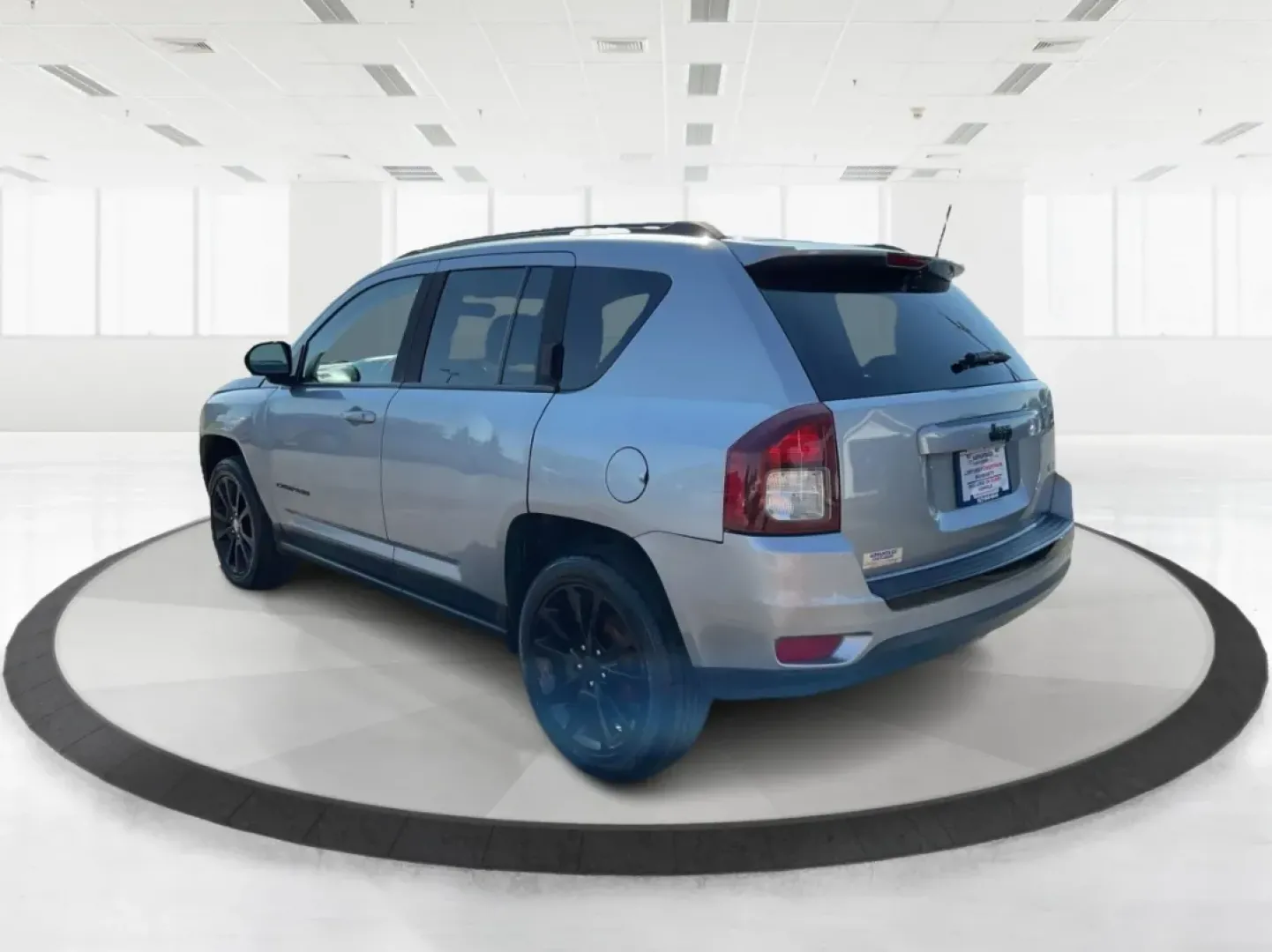 2015 Jeep Compass Altitude Edition (1C4NJCBA6FD) with an 2L I-4 DOHC engine, located at 1184 Kauffman Ave, Fairborn, OH, 45324, (937) 908-9800, 39.807072, -84.030914 - **Adventure Awaits in the 2015 Jeep Compass Altitude Edition at Advantage Car and Credit - Fairborn!**<br /> <br /> Are you ready for your next adventure? The 2015 Jeep Compass Altitude Edition is your perfect companion for weekend getaways, family road trips, or even your daily commute! This versat - Photo#4