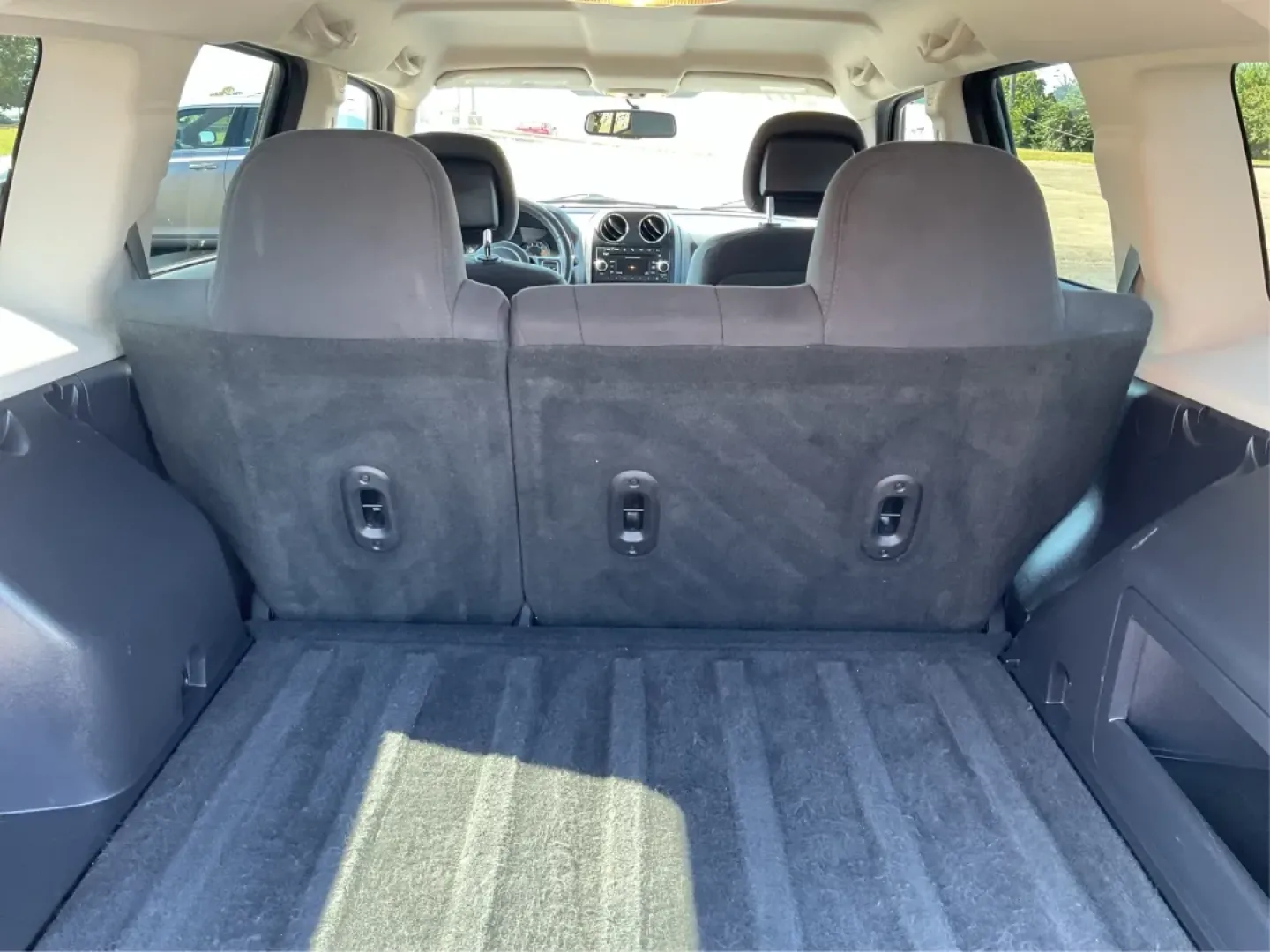 2015 Jeep Patriot Latitude (1C4NJRFB6FD) with an 2.4L I-4 DOHC engine, located at 1099 N County Rd 25A , Troy, OH, 45373, (937) 908-9800, 40.057079, -84.212883 - Discover the freedom of adventure with this 2015 Jeep Patriot Latitude, perfect for those who crave weekend getaways or family outings. With ample space and rugged capabilities, this SUV is designed for both urban commuting and off-road excursions. Whether you're navigating Troy's scenic backroads o - Photo#12