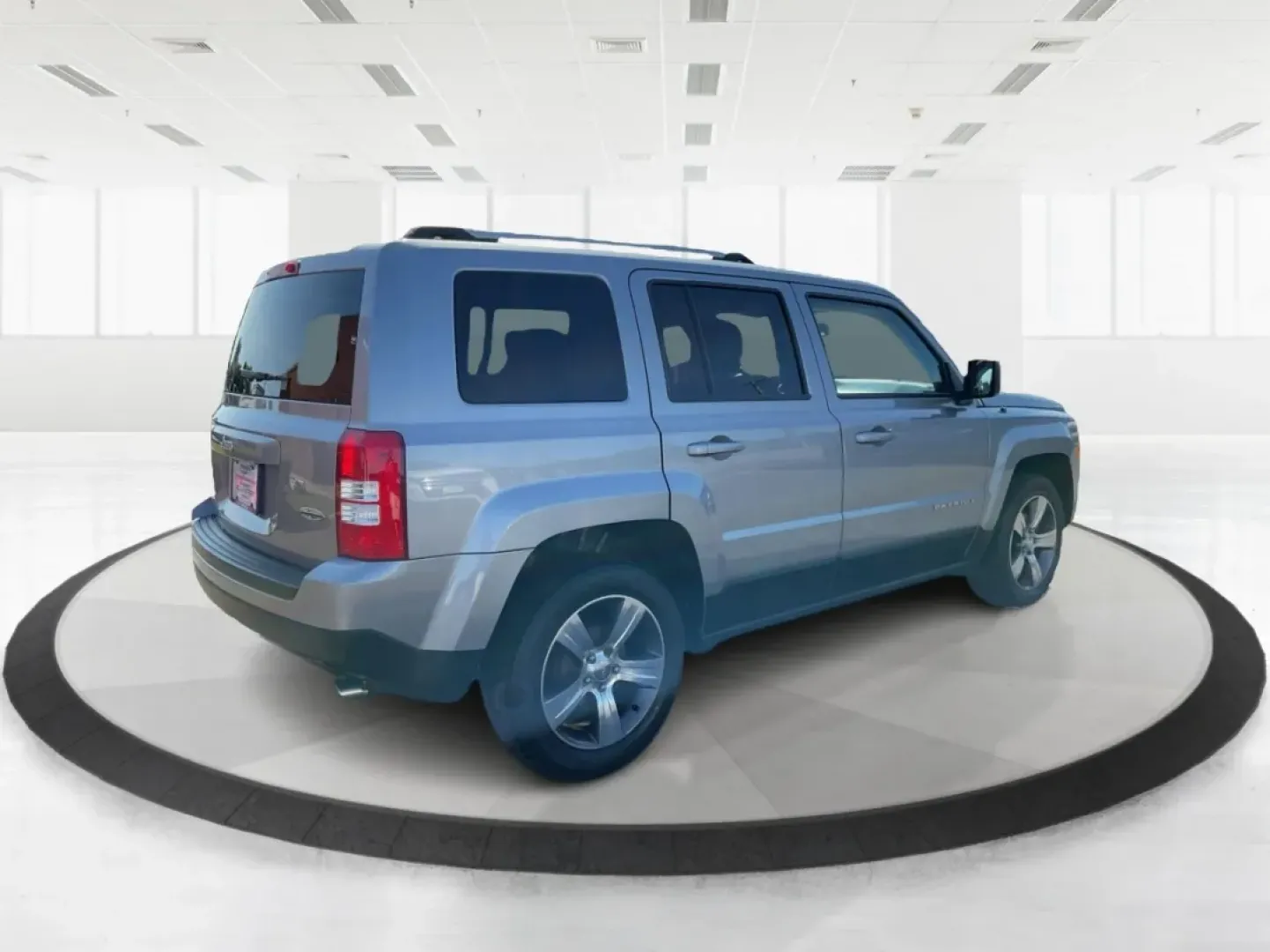 2016 Jeep Patriot High Altitude Edition (1C4NJPFA3GD) with an 2L I-4 DOHC engine, located at 1951 S Dayton Lakeview Rd., New Carlisle, OH, 45344, (937) 908-9800, 39.890999, -84.050255 - Explore the open roads and off-the-beaten-path adventures with this stunning 2016 Jeep Patriot High Altitude Edition, available now at Advantage Car and Credit in New Carlisle, OH. If you're a weekend warrior looking for a reliable and versatile SUV that accommodates your active lifestyle, this Jeep - Photo#2