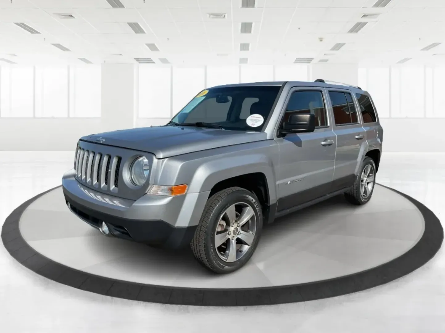 2016 Jeep Patriot High Altitude Edition (1C4NJPFA3GD) with an 2L I-4 DOHC engine, located at 1951 S Dayton Lakeview Rd., New Carlisle, OH, 45344, (937) 908-9800, 39.890999, -84.050255 - Explore the open roads and off-the-beaten-path adventures with this stunning 2016 Jeep Patriot High Altitude Edition, available now at Advantage Car and Credit in New Carlisle, OH. If you're a weekend warrior looking for a reliable and versatile SUV that accommodates your active lifestyle, this Jeep - Photo#8