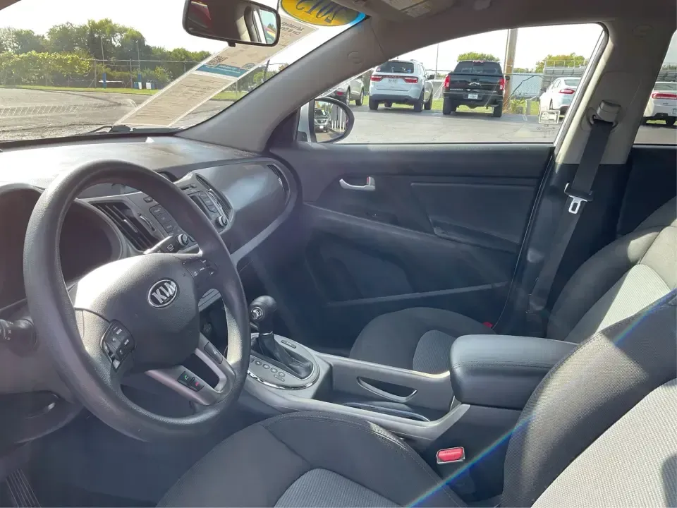 2015 Kia Sportage LX (KNDPBCAC2F7) with an 2.4L V6 DOHC 24V engine, 6-Speed Automatic transmission, located at 4508 South Dixie Dr, Moraine, OH, 45439, (937) 908-9800, 39.689976, -84.218452 - Are you ready to elevate your driving experience and embark on unforgettable adventures? Look no further than this 2015 Kia Sportage LX, perfect for those who crave a reliable crossover that blends style with versatility. Whether you're commuting to work, shuttling the kids to school, or planning a - Photo#9