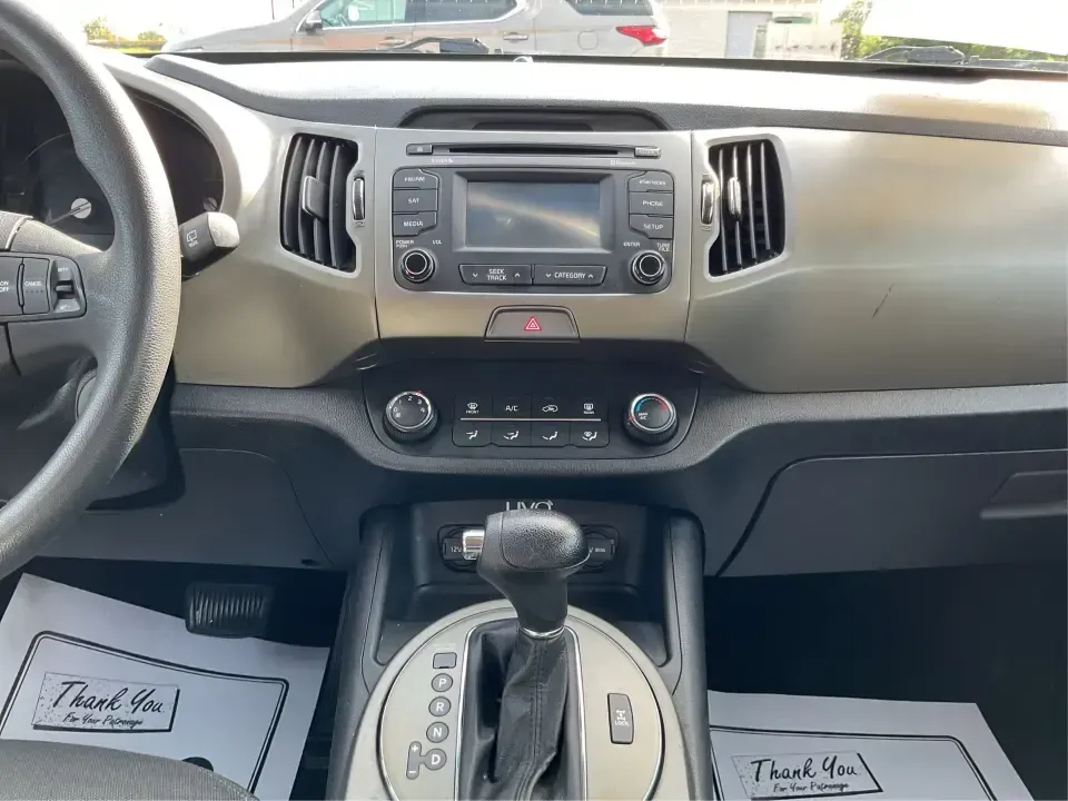 2015 Kia Sportage LX (KNDPBCAC2F7) with an 2.4L V6 DOHC 24V engine, 6-Speed Automatic transmission, located at 4508 South Dixie Dr, Moraine, OH, 45439, (937) 908-9800, 39.689976, -84.218452 - Are you ready to elevate your driving experience and embark on unforgettable adventures? Look no further than this 2015 Kia Sportage LX, perfect for those who crave a reliable crossover that blends style with versatility. Whether you're commuting to work, shuttling the kids to school, or planning a - Photo#13