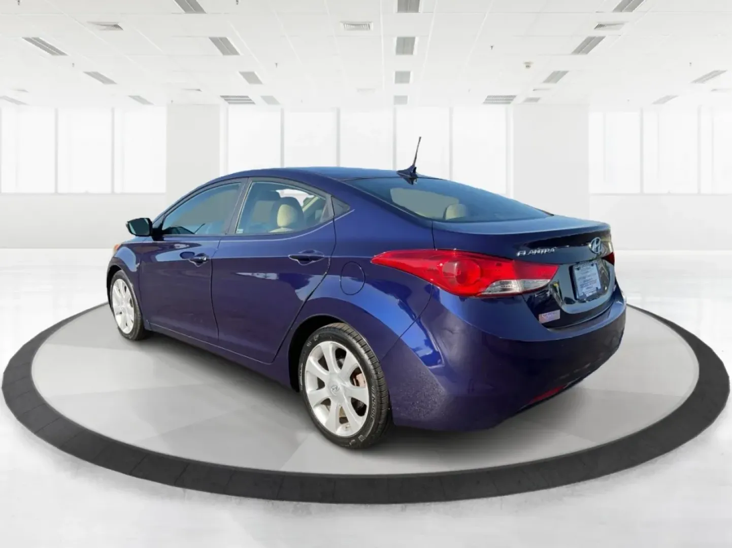 2013 Hyundai Elantra Limited (5NPDH4AEXDH) with an 1.8L I-4 DOHC engine, located at 8750 N County Rd 25A, Piqua, OH, 45356, (937) 908-9800, 40.164391, -84.232513 - **Experience the Perfect Blend of Comfort and Style with the 2013 Hyundai Elantra at Advantage Car and Credit - Piqua!**<br /> <br /> Are you searching for a reliable sedan that perfectly balances style, comfort, and affordability? The 2013 Hyundai Elantra is your ideal companion, whether you're com - Photo#4