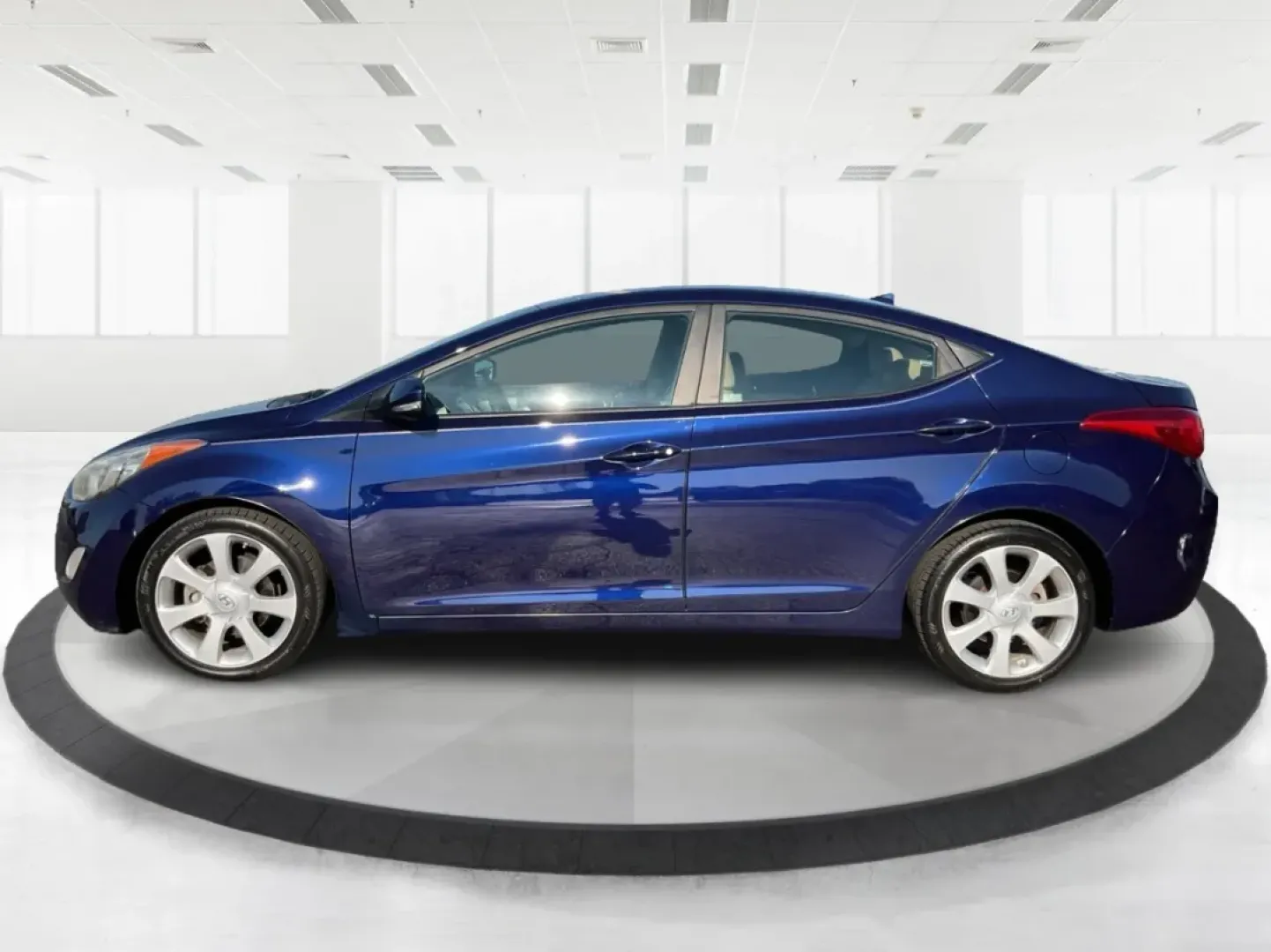 2013 Hyundai Elantra Limited (5NPDH4AEXDH) with an 1.8L I-4 DOHC engine, located at 8750 N County Rd 25A, Piqua, OH, 45356, (937) 908-9800, 40.164391, -84.232513 - **Experience the Perfect Blend of Comfort and Style with the 2013 Hyundai Elantra at Advantage Car and Credit - Piqua!**<br /> <br /> Are you searching for a reliable sedan that perfectly balances style, comfort, and affordability? The 2013 Hyundai Elantra is your ideal companion, whether you're com - Photo#5