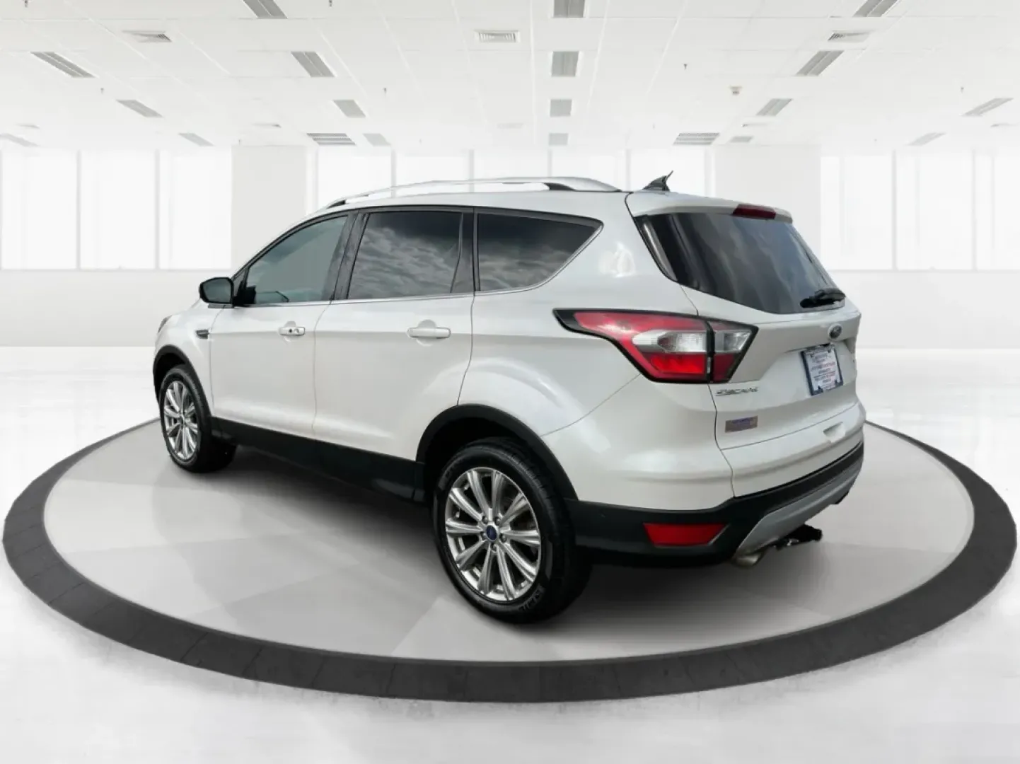 2018 Ford Escape Titanium (1FMCU9J97JU) with an EcoBoost 2L I-4 gasoline direct injection engine, located at 8750 N County Rd 25A, Piqua, OH, 45356, (937) 908-9800, 40.164391, -84.232513 - **Unleash Adventure with Your 2018 Ford Escape Titanium Perfect for Weekend Getaways!**<br /> <br /> If you're searching for a versatile vehicle that caters to your adventurous spirit while providing the comfort and style you deserve, look no further than the stunning 2018 Ford Escape Titanium avai - Photo#4