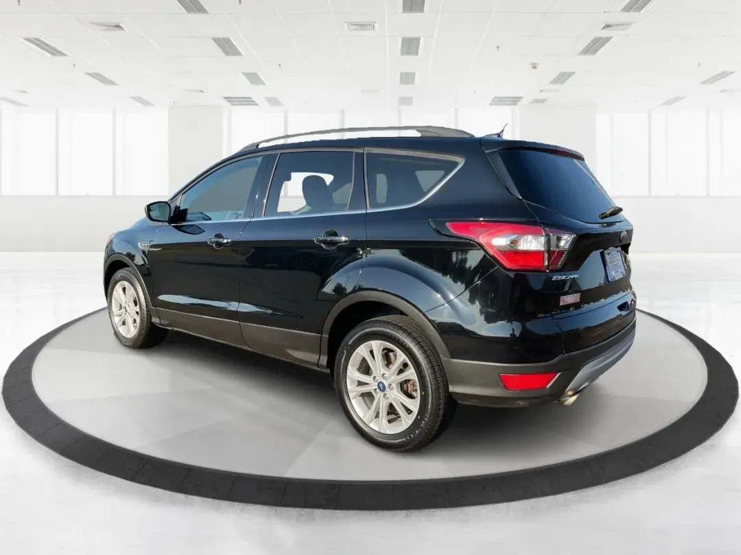 2018 Ford Escape SE (1FMCU0GD6JU) with an Other engine, located at 1184 Kauffman Ave, Fairborn, OH, 45324, (937) 908-9800, 39.807072, -84.030914 - Experience adventure and comfort on the open road with the 2018 Ford Escape SE, available now at Advantage Car and Credit in Vandalia, OH. This versatile SUV is perfect for families, outdoor enthusiasts, and commuters alike, providing a seamless blend of style, safety, and functionality. With plenty - Photo#4