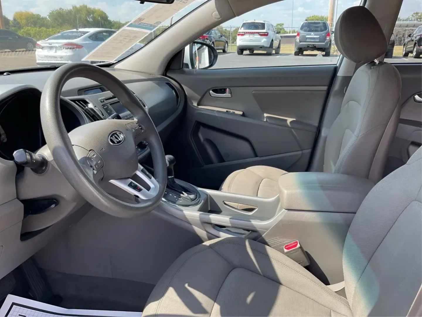 2013 Kia Sportage LX (KNDPBCA26D7) with an 2.4L I-4 DOHC engine, located at 8750 N County Rd 25A, Piqua, OH, 45356, (937) 908-9800, 40.164391, -84.232513 - Experience the ultimate blend of versatility and comfort with this 2013 Kia Sportage LX, perfect for families on the go, urban commuters, or those planning outdoor weekend adventures. This reliable crossover's spacious interior and dynamic performance make it an ideal choice for drivers seeking a de - Photo#9