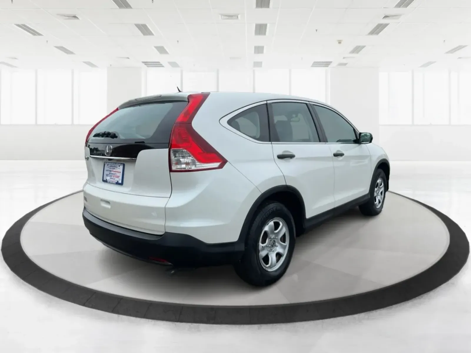 2013 Honda CR-V LX (5J6RM3H37DL) with an 2.4L I-4 DOHC engine, located at 4508 South Dixie Dr, Moraine, OH, 45439, (937) 908-9800, 39.689976, -84.218452 - If you're searching for a reliable vehicle that perfectly balances space, comfort, and efficiency for your family or daily commute, look no further than this 2013 Honda CR-V LX, proudly offered by Advantage Car and Credit in Fairborn, OH. Located conveniently at 1184 Kauffman Ave, we specialize in * - Photo#2