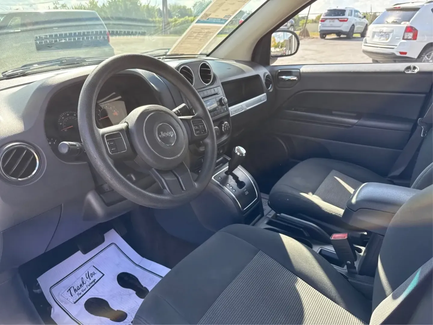 2016 Jeep Compass Sport (1C4NJCBA6GD) with an Other engine, located at 880 E. National Road, Vandalia, OH, 45377, (937) 908-9800, 39.891918, -84.183594 - **Adventure Awaits: Discover the 2016 Jeep Compass Sport at Advantage Car and Credit!**<br /> <br /> Are you ready to embrace the open road and tackle weekend adventures? Look no further than the 2016 Jeep Compass Sport, a versatile SUV that fits seamlessly into your active lifestyle. Whether you're - Photo#9