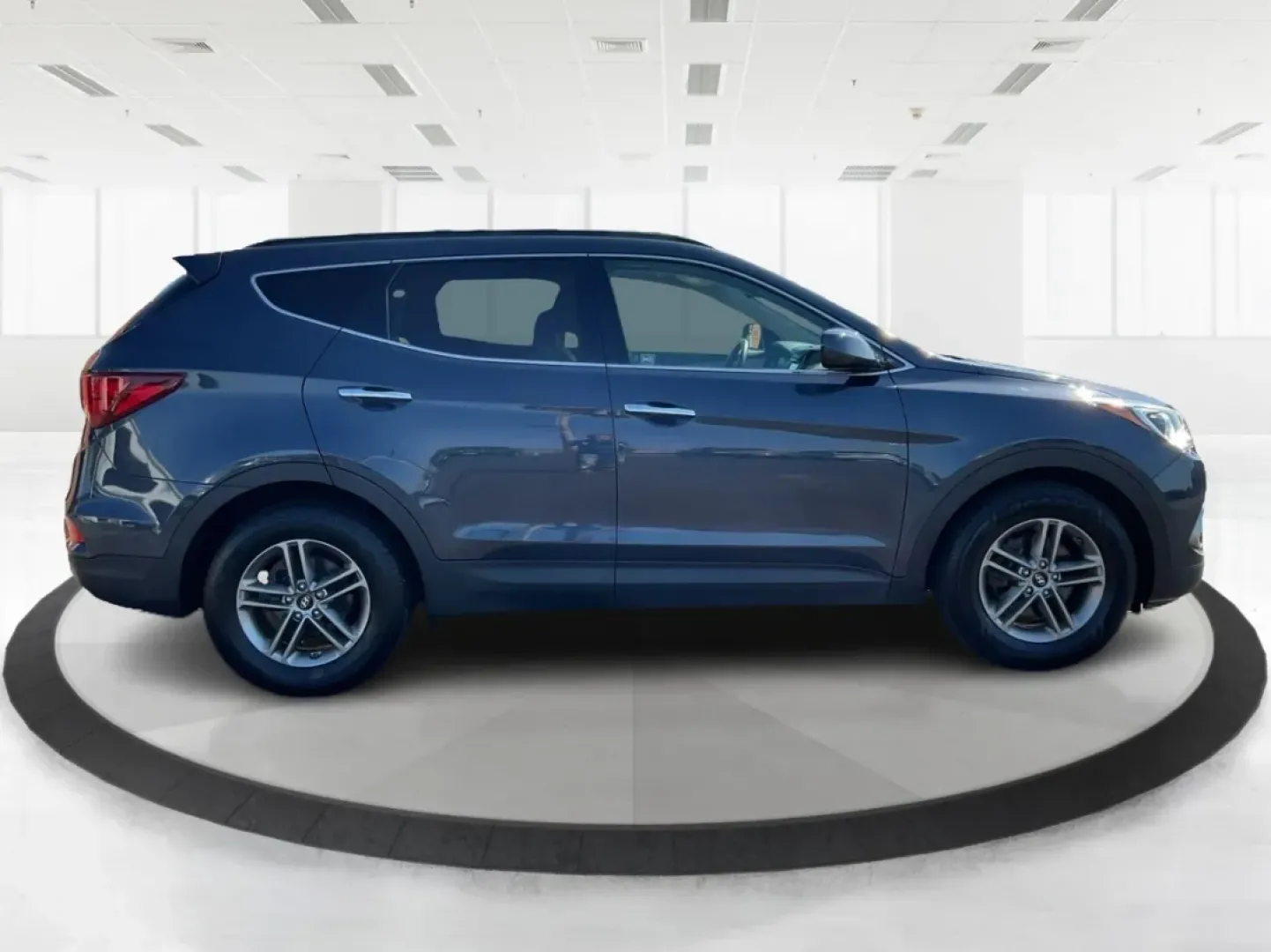 2017 Hyundai Santa Fe Sport 2.4 FWD (5NMZU3LB6HH) with an 2.4L L4 DOHC 16V engine, 6-Speed Automatic transmission, located at 4508 South Dixie Dr, Moraine, OH, 45439, (937) 908-9800, 39.689976, -84.218452 - **Explore Adventure with the 2017 Hyundai Santa Fe - Perfect for Families and Weekend Warriors!**<br /> <br /> Are you in search of a versatile SUV that can handle everything from family road trips to daily commutes? Look no further! The 2017 Hyundai Santa Fe, featuring a stunning Marlin Blue exteri - Photo#1