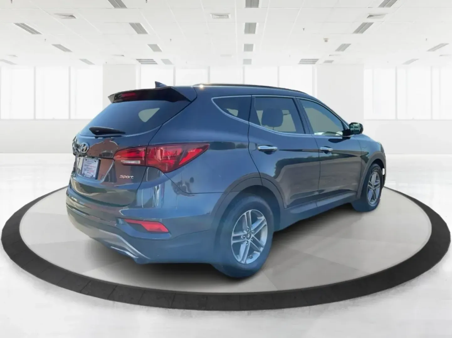 2017 Hyundai Santa Fe Sport 2.4 FWD (5NMZU3LB6HH) with an 2.4L L4 DOHC 16V engine, 6-Speed Automatic transmission, located at 4508 South Dixie Dr, Moraine, OH, 45439, (937) 908-9800, 39.689976, -84.218452 - **Explore Adventure with the 2017 Hyundai Santa Fe - Perfect for Families and Weekend Warriors!**<br /> <br /> Are you in search of a versatile SUV that can handle everything from family road trips to daily commutes? Look no further! The 2017 Hyundai Santa Fe, featuring a stunning Marlin Blue exteri - Photo#2