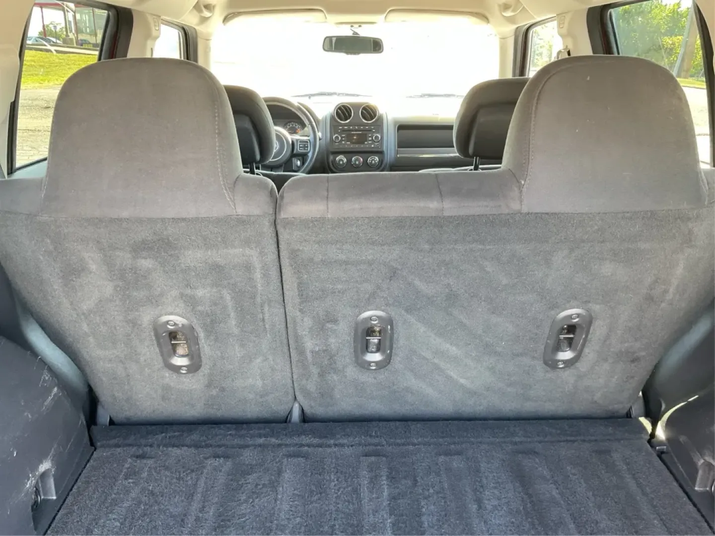 2015 Jeep Patriot Latitude (1C4NJRFB0FD) with an 2.4L I-4 DOHC engine, located at 4508 South Dixie Dr, Moraine, OH, 45439, (937) 908-9800, 39.689976, -84.218452 - **Adventure Awaits with the 2015 Jeep Patriot Latitude Your Perfect Companion for Every Journey!**<br /> <br /> At Advantage Car and Credit - Riverside, located at 401 Woodman Dr, Riverside, OH 45431, we understand that life is an adventure, whether it's gearing up for a weekend getaway or managing - Photo#12