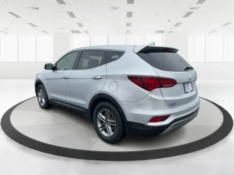 2017 Hyundai Santa Fe 2.4L (5XYZTDLB2HG) with an Theta II 2.4L I-4 gasoline direct injection engine, 6A transmission, located at 1951 S Dayton Lakeview Rd., New Carlisle, OH, 45344, (937) 908-9800, 39.890999, -84.050255 - Discover the perfect blend of comfort, capability, and style with the 2017 Hyundai Santa Fe, now available at Advantage Car and Credit, located at 1184 Kauffman Ave, Fairborn, OH 45324. This versatile SUV is an excellent choice for growing families, weekend adventurers, or budget-conscious buyers lo - Photo#4