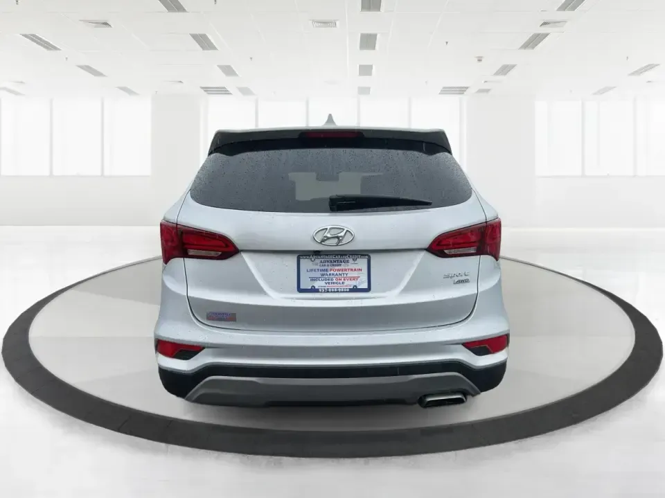 2017 Hyundai Santa Fe 2.4L (5XYZTDLB2HG) with an Theta II 2.4L I-4 gasoline direct injection engine, 6A transmission, located at 8750 N County Rd 25A, Piqua, OH, 45356, (937) 908-9800, 40.164391, -84.232513 - Discover the perfect blend of comfort, capability, and style with the 2017 Hyundai Santa Fe, now available at Advantage Car and Credit, located at 1184 Kauffman Ave, Fairborn, OH 45324. This versatile SUV is an excellent choice for growing families, weekend adventurers, or budget-conscious buyers lo - Photo#3