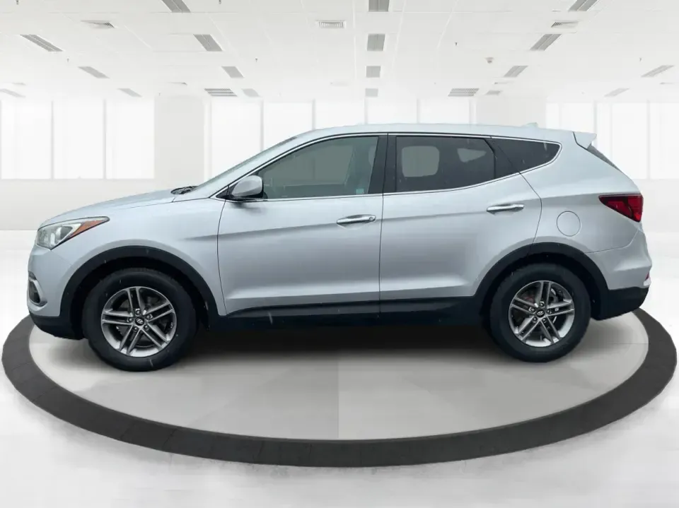 2017 Hyundai Santa Fe 2.4L (5XYZTDLB2HG) with an Theta II 2.4L I-4 gasoline direct injection engine, 6A transmission, located at 8750 N County Rd 25A, Piqua, OH, 45356, (937) 908-9800, 40.164391, -84.232513 - Discover the perfect blend of comfort, capability, and style with the 2017 Hyundai Santa Fe, now available at Advantage Car and Credit, located at 1184 Kauffman Ave, Fairborn, OH 45324. This versatile SUV is an excellent choice for growing families, weekend adventurers, or budget-conscious buyers lo - Photo#5