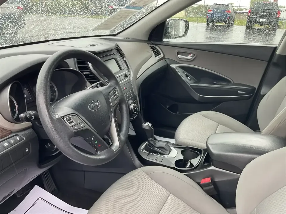 2017 Hyundai Santa Fe 2.4L (5XYZTDLB2HG) with an Theta II 2.4L I-4 gasoline direct injection engine, 6A transmission, located at 8750 N County Rd 25A, Piqua, OH, 45356, (937) 908-9800, 40.164391, -84.232513 - Discover the perfect blend of comfort, capability, and style with the 2017 Hyundai Santa Fe, now available at Advantage Car and Credit, located at 1184 Kauffman Ave, Fairborn, OH 45324. This versatile SUV is an excellent choice for growing families, weekend adventurers, or budget-conscious buyers lo - Photo#9