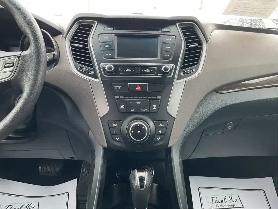 2017 Hyundai Santa Fe 2.4L (5XYZTDLB2HG) with an Theta II 2.4L I-4 gasoline direct injection engine, 6A transmission, located at 8750 N County Rd 25A, Piqua, OH, 45356, (937) 908-9800, 40.164391, -84.232513 - Discover the perfect blend of comfort, capability, and style with the 2017 Hyundai Santa Fe, now available at Advantage Car and Credit, located at 1184 Kauffman Ave, Fairborn, OH 45324. This versatile SUV is an excellent choice for growing families, weekend adventurers, or budget-conscious buyers lo - Photo#13