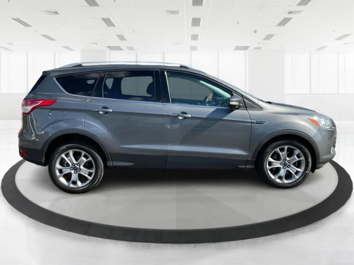2014 Ford Escape Titanium 4WD (1FMCU9J92EU) with an 2.0L L4 DOHC 16V engine, 6-Speed Automatic transmission, located at 1184 Kauffman Ave, Fairborn, OH, 45324, (937) 908-9800, 39.807072, -84.030914 - Looking for a versatile vehicle that accommodates your dynamic lifestyle? Meet the 2014 Ford Escape Titanium, the perfect SUV for growing families, adventurous souls, and budget-conscious buyers alike! With its impressive blend of performance, comfort, and cutting-edge technology, this Ford Escape i - Photo#1