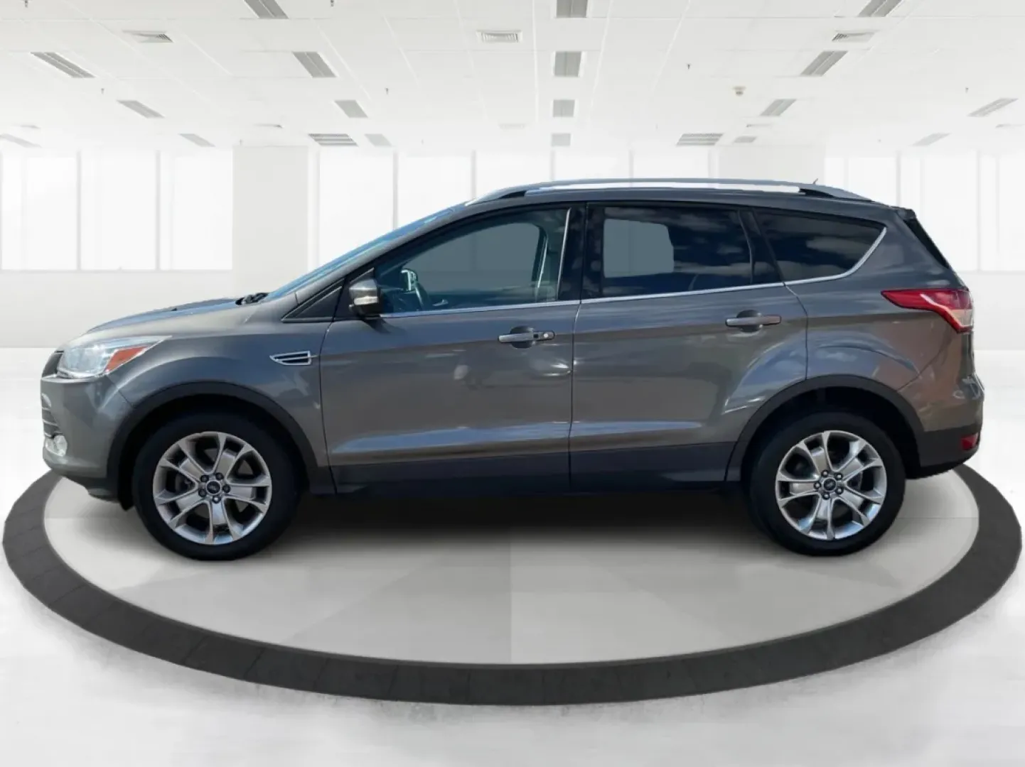 2014 Ford Escape Titanium 4WD (1FMCU9J92EU) with an 2.0L L4 DOHC 16V engine, 6-Speed Automatic transmission, located at 1184 Kauffman Ave, Fairborn, OH, 45324, (937) 908-9800, 39.807072, -84.030914 - Looking for a versatile vehicle that accommodates your dynamic lifestyle? Meet the 2014 Ford Escape Titanium, the perfect SUV for growing families, adventurous souls, and budget-conscious buyers alike! With its impressive blend of performance, comfort, and cutting-edge technology, this Ford Escape i - Photo#5