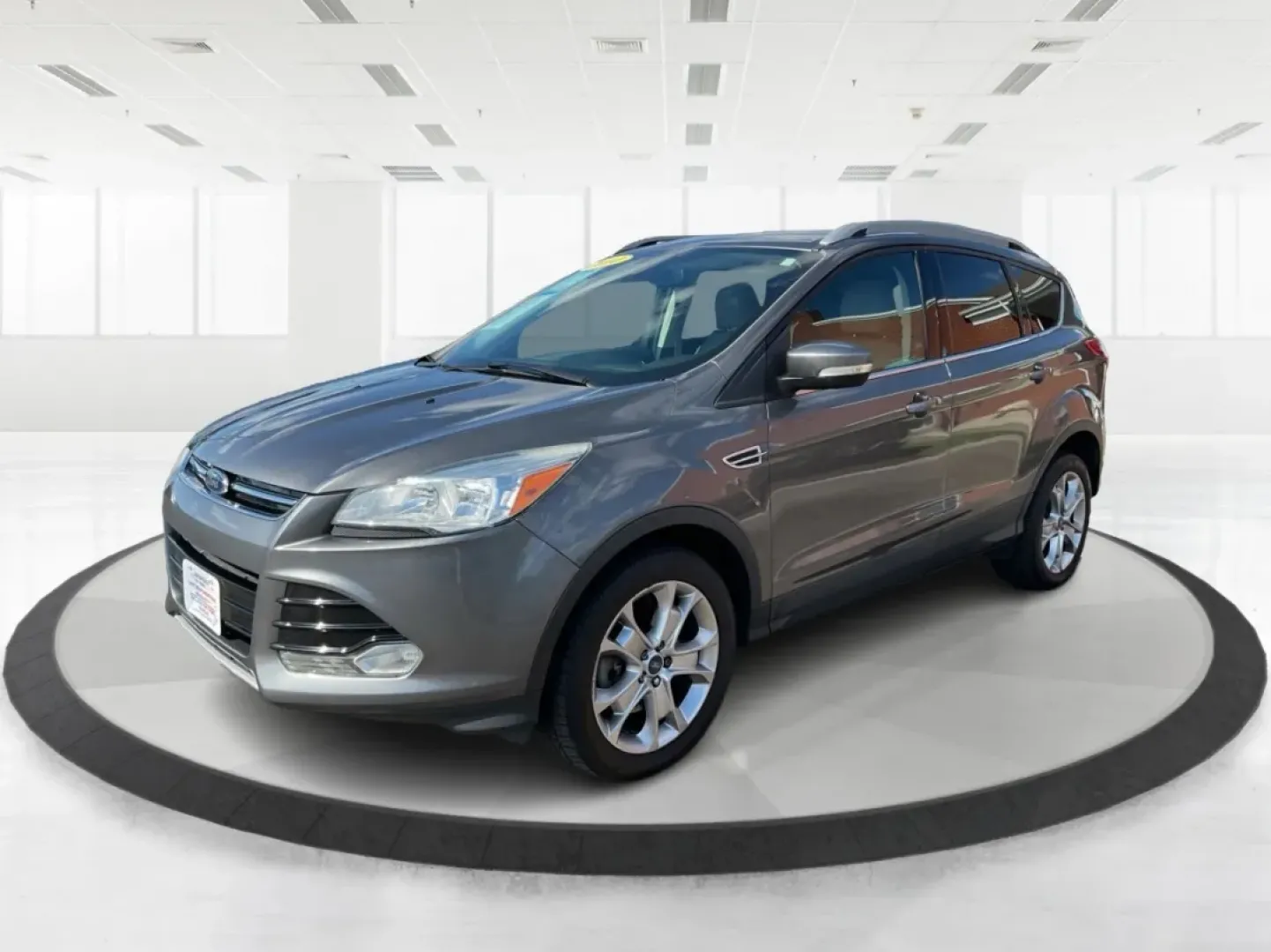 2014 Ford Escape Titanium 4WD (1FMCU9J92EU) with an 2.0L L4 DOHC 16V engine, 6-Speed Automatic transmission, located at 1184 Kauffman Ave, Fairborn, OH, 45324, (937) 908-9800, 39.807072, -84.030914 - Looking for a versatile vehicle that accommodates your dynamic lifestyle? Meet the 2014 Ford Escape Titanium, the perfect SUV for growing families, adventurous souls, and budget-conscious buyers alike! With its impressive blend of performance, comfort, and cutting-edge technology, this Ford Escape i - Photo#8