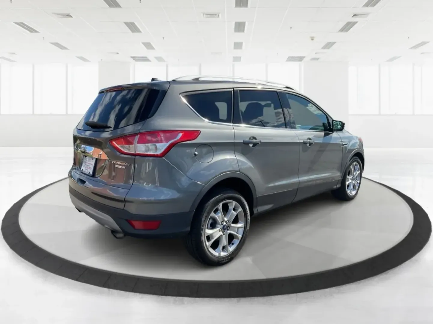 2014 Ford Escape Titanium 4WD (1FMCU9J92EU) with an 2.0L L4 DOHC 16V engine, 6-Speed Automatic transmission, located at 401 Woodman Dr, Riverside, OH, 45431, (937) 908-9800, 39.760899, -84.123421 - Looking for a versatile vehicle that accommodates your dynamic lifestyle? Meet the 2014 Ford Escape Titanium, the perfect SUV for growing families, adventurous souls, and budget-conscious buyers alike! With its impressive blend of performance, comfort, and cutting-edge technology, this Ford Escape i - Photo#2