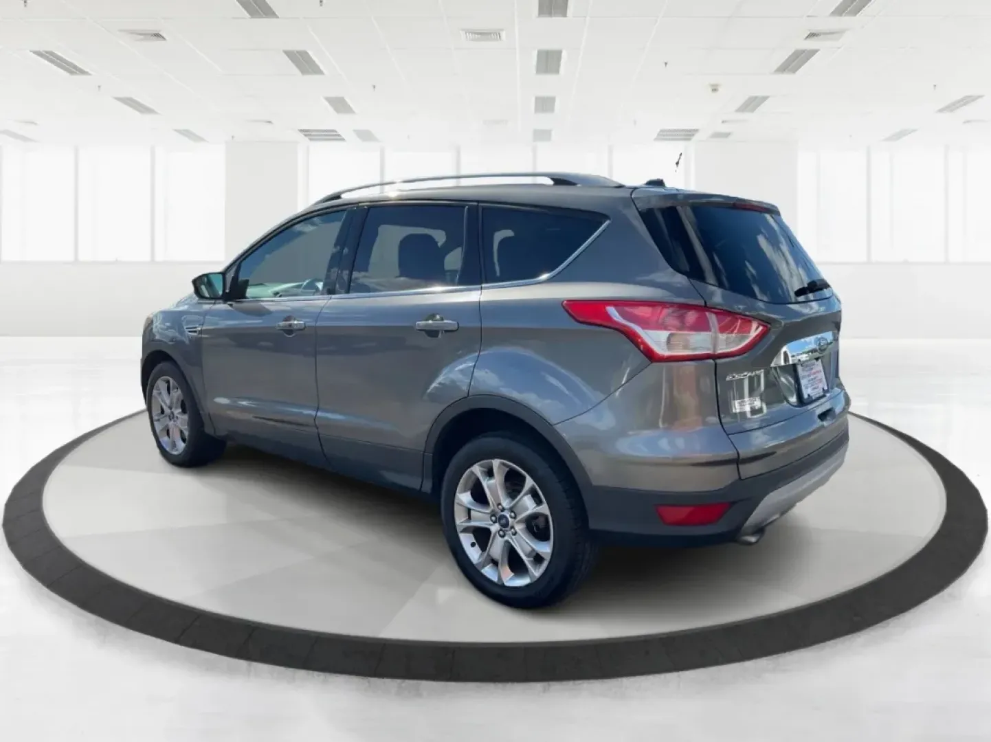 2014 Ford Escape Titanium 4WD (1FMCU9J92EU) with an 2.0L L4 DOHC 16V engine, 6-Speed Automatic transmission, located at 401 Woodman Dr, Riverside, OH, 45431, (937) 908-9800, 39.760899, -84.123421 - Looking for a versatile vehicle that accommodates your dynamic lifestyle? Meet the 2014 Ford Escape Titanium, the perfect SUV for growing families, adventurous souls, and budget-conscious buyers alike! With its impressive blend of performance, comfort, and cutting-edge technology, this Ford Escape i - Photo#4