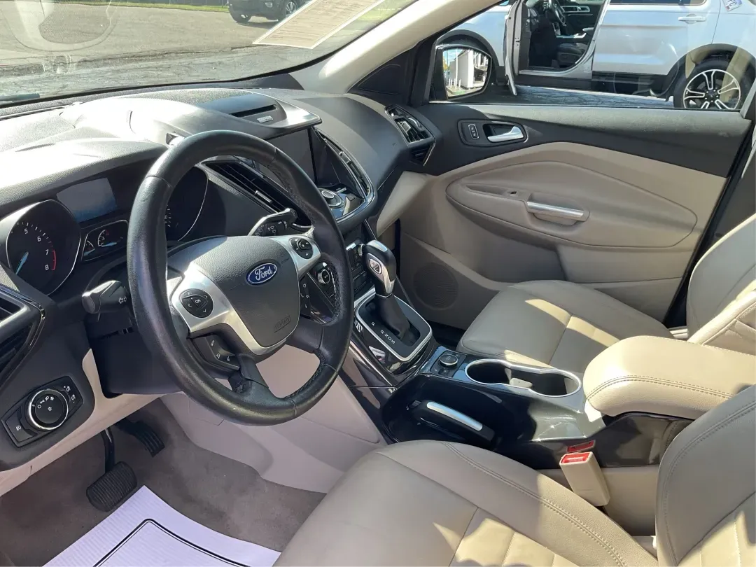 2014 Ford Escape Titanium 4WD (1FMCU9J92EU) with an 2.0L L4 DOHC 16V engine, 6-Speed Automatic transmission, located at 401 Woodman Dr, Riverside, OH, 45431, (937) 908-9800, 39.760899, -84.123421 - Looking for a versatile vehicle that accommodates your dynamic lifestyle? Meet the 2014 Ford Escape Titanium, the perfect SUV for growing families, adventurous souls, and budget-conscious buyers alike! With its impressive blend of performance, comfort, and cutting-edge technology, this Ford Escape i - Photo#9