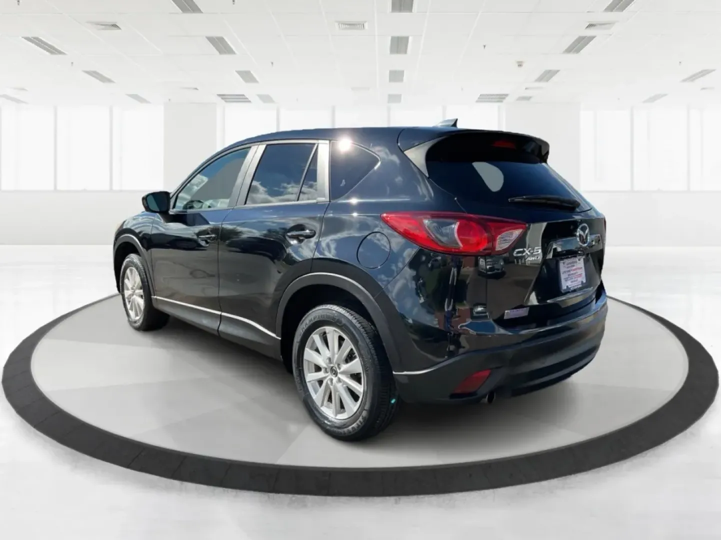 2014 Mazda CX-5 Touring AWD (JM3KE4CY2E0) with an 2.5L L4 DOHC 16V engine, 6-Speed Automatic transmission, located at 880 E. National Road, Vandalia, OH, 45377, (937) 908-9800, 39.891918, -84.183594 - **Explore the Open Road in the 2014 Mazda CX-5 Touring AWD from Advantage Car and Credit - Troy!**<br /> <br /> Are you ready to elevate your driving experience? Whether you're a growing family seeking a reliable SUV for weekend adventures, a commuter looking for comfort on long drives, or a budget- - Photo#4