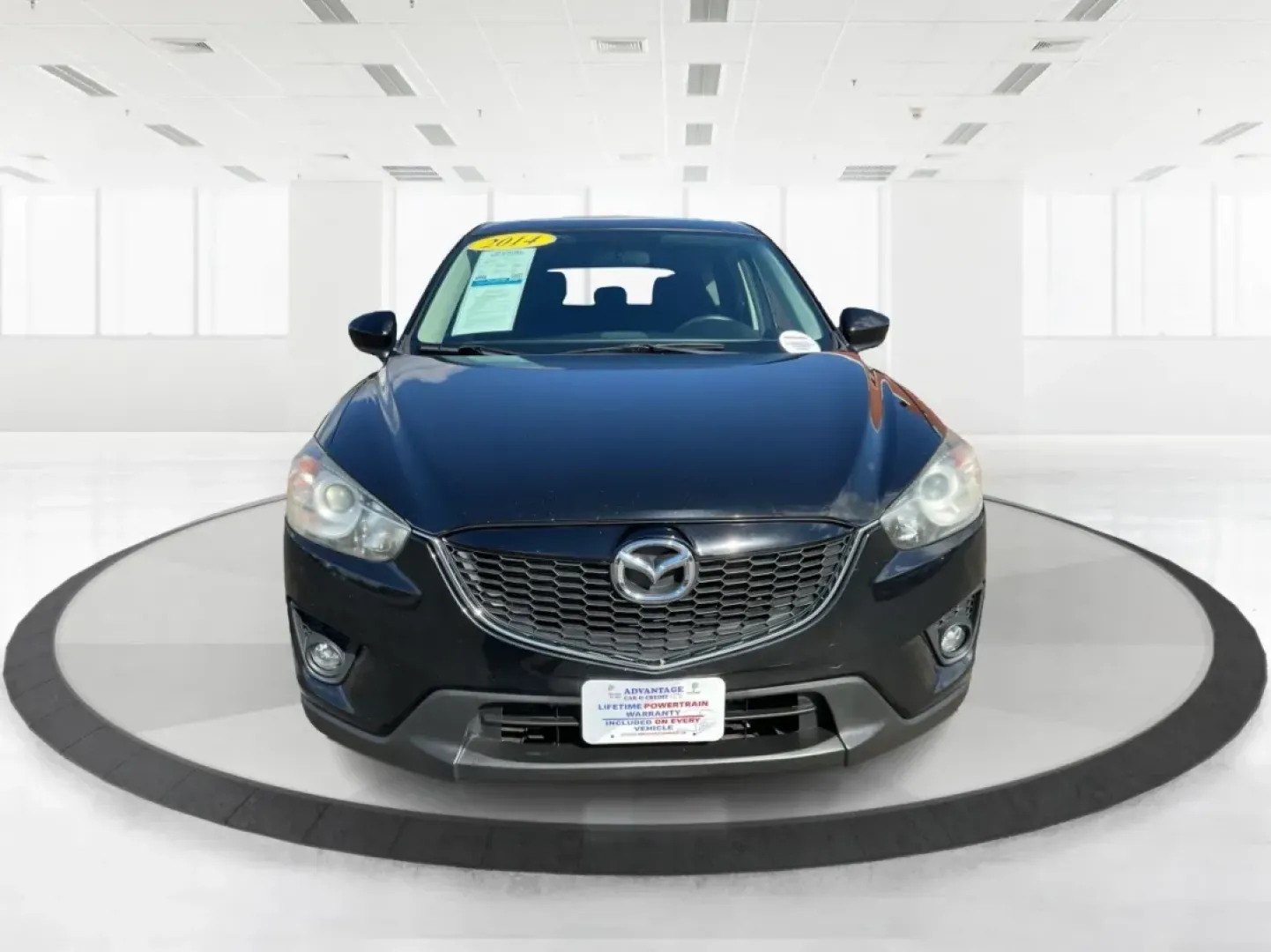 2014 Mazda CX-5 Touring AWD (JM3KE4CY2E0) with an 2.5L L4 DOHC 16V engine, 6-Speed Automatic transmission, located at 880 E. National Road, Vandalia, OH, 45377, (937) 908-9800, 39.891918, -84.183594 - **Explore the Open Road in the 2014 Mazda CX-5 Touring AWD from Advantage Car and Credit - Troy!**<br /> <br /> Are you ready to elevate your driving experience? Whether you're a growing family seeking a reliable SUV for weekend adventures, a commuter looking for comfort on long drives, or a budget- - Photo#7