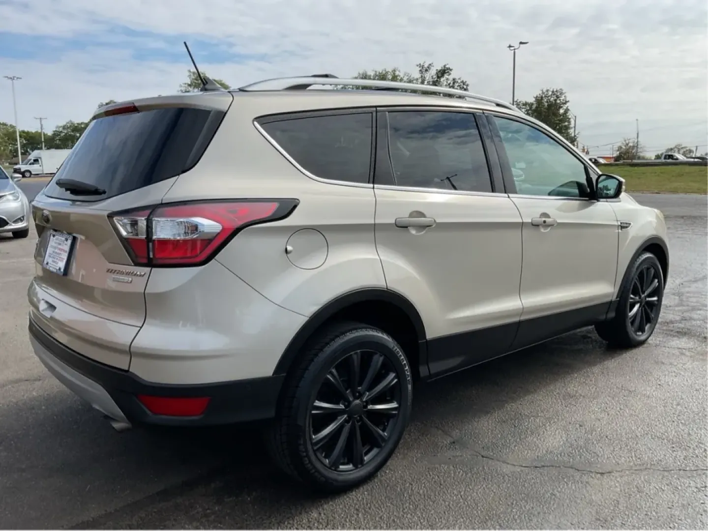 2018 Ford Escape Titanium FWD (1FMCU0J99JU) with an 2.0L L4 DOHC 16V engine, 6-Speed Automatic transmission, located at 1230 East Main St, Xenia, OH, 45385, (937) 908-9800, 39.688026, -83.910172 - Experience the perfect blend of style and practicality with the 2018 Ford Escape Titanium, now available at Advantage Car and Credit in Xenia, OH. This SUV is not just a vehicle; it's your ticket to adventure, whether you're navigating the bustling streets of downtown Xenia or embarking on a weekend - Photo#2