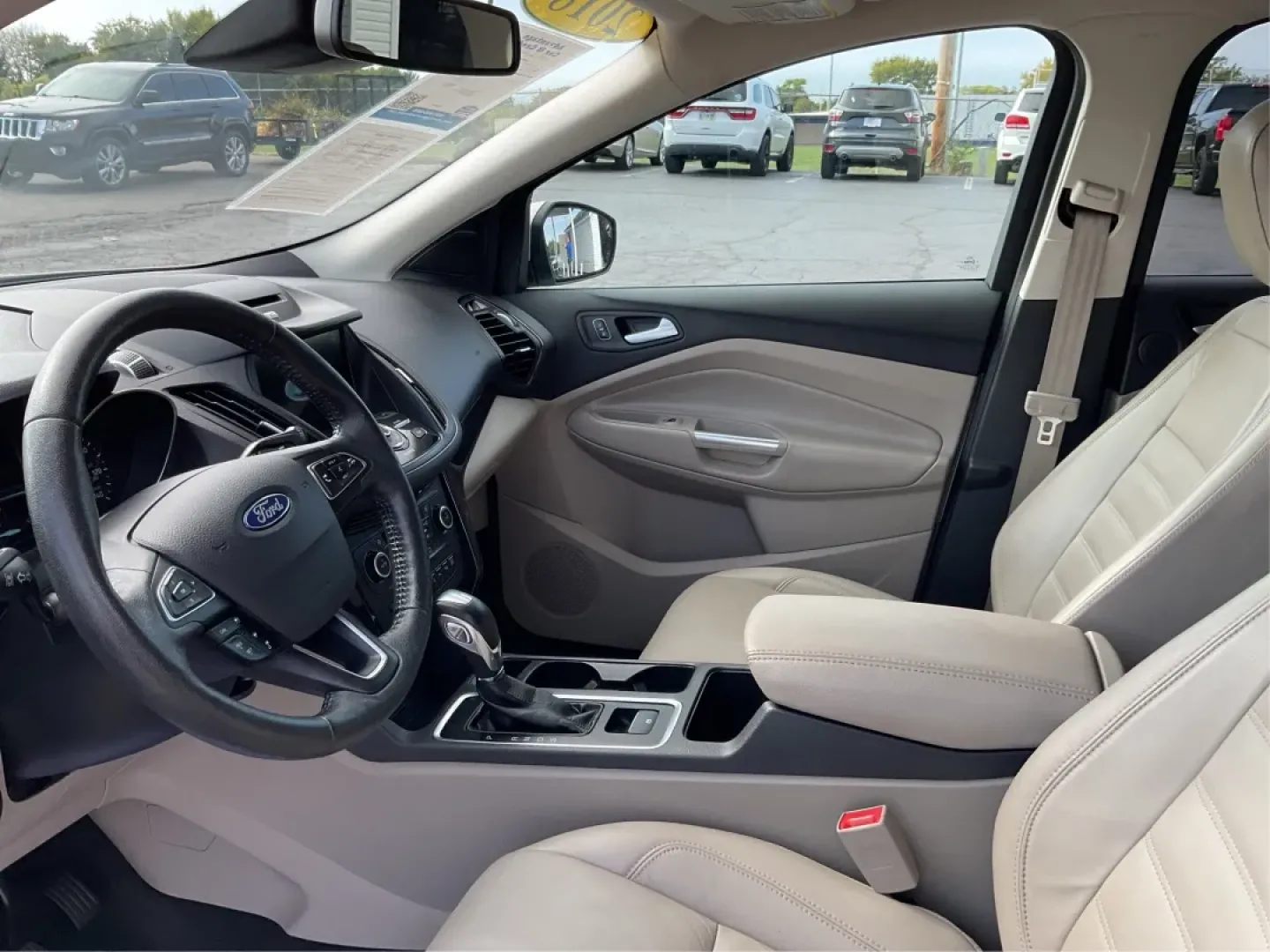 2018 Ford Escape Titanium FWD (1FMCU0J99JU) with an 2.0L L4 DOHC 16V engine, 6-Speed Automatic transmission, located at 1230 East Main St, Xenia, OH, 45385, (937) 908-9800, 39.688026, -83.910172 - Experience the perfect blend of style and practicality with the 2018 Ford Escape Titanium, now available at Advantage Car and Credit in Xenia, OH. This SUV is not just a vehicle; it's your ticket to adventure, whether you're navigating the bustling streets of downtown Xenia or embarking on a weekend - Photo#9