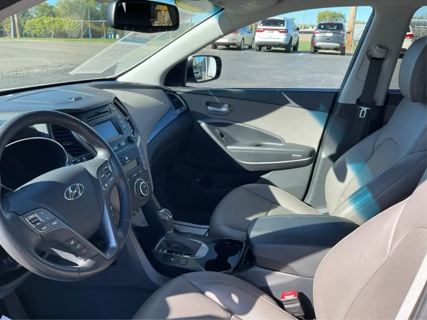 2014 Hyundai Santa Fe 2.4L (5XYZUDLB3EG) with an Theta II 2.4L I-4 gasoline direct injection engine, located at 1099 N County Rd 25A , Troy, OH, 45373, (937) 908-9800, 40.057079, -84.212883 - Are you ready to elevate your driving experience and embrace a lifestyle of adventure? The 2014 Hyundai Santa Fe available at Advantage Car and Credit in Troy, OH, is not just a vehicle; it's your gateway to unforgettable road trips, family outings, and daily commutes. This versatile SUV combines st - Photo#9