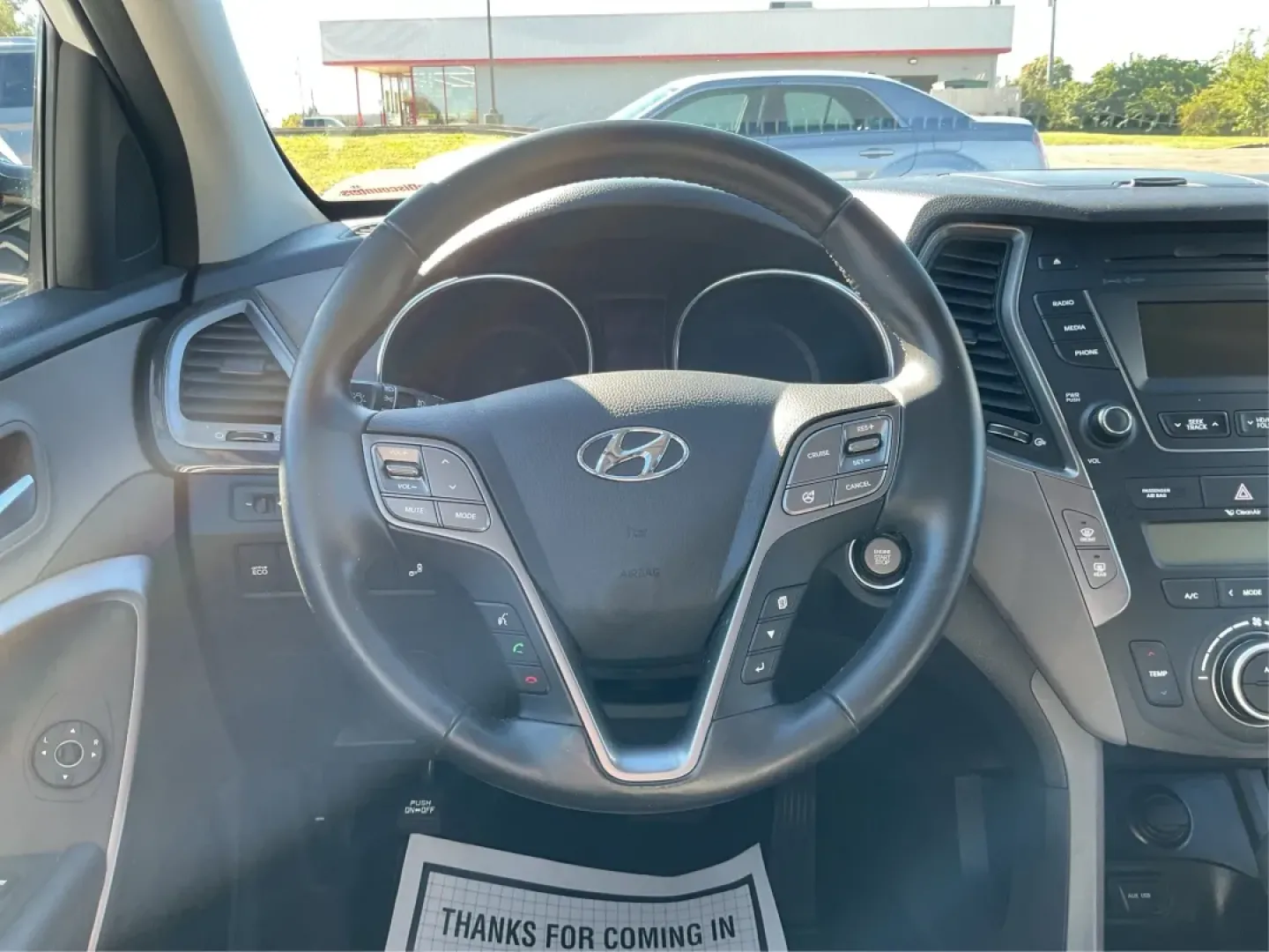 2014 Hyundai Santa Fe 2.4L (5XYZUDLB3EG) with an Theta II 2.4L I-4 gasoline direct injection engine, located at 1099 N County Rd 25A , Troy, OH, 45373, (937) 908-9800, 40.057079, -84.212883 - Are you ready to elevate your driving experience and embrace a lifestyle of adventure? The 2014 Hyundai Santa Fe available at Advantage Car and Credit in Troy, OH, is not just a vehicle; it's your gateway to unforgettable road trips, family outings, and daily commutes. This versatile SUV combines st - Photo#16