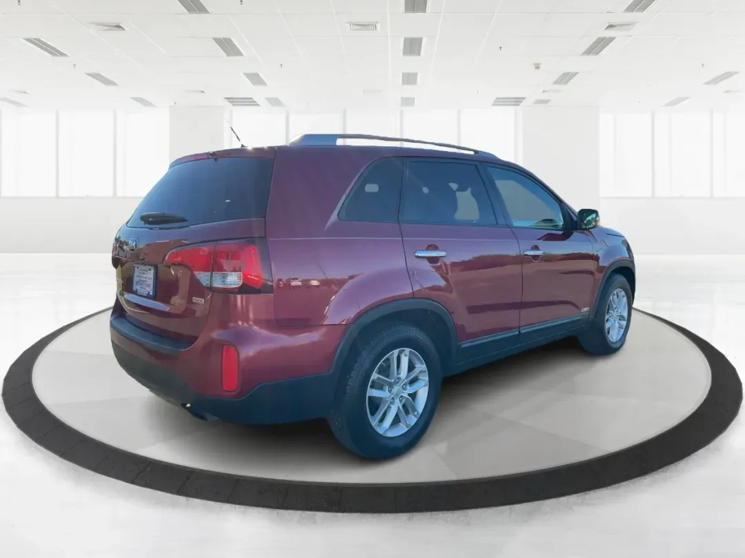 2015 Kia Sorento LX (5XYKTCA66FG) with an 2.4L I-4 gasoline direct injection engine, located at 4508 South Dixie Dr, Moraine, OH, 45439, (937) 908-9800, 39.689976, -84.218452 - **Adventure Awaits with the 2015 Kia Sorento LX from Advantage Car and Credit!**<br /> <br /> Are you ready to elevate your family outings or embark on unforgettable weekend adventures? Look no further than this stunning **2015 Kia Sorento LX**! With its striking Remington Red Metallic exterior and - Photo#2