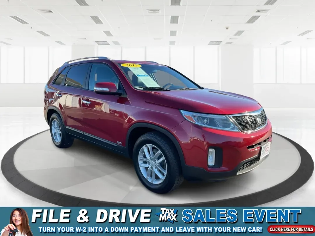 2015 Kia Sorento LX (5XYKTCA66FG) with an 2.4L I-4 gasoline direct injection engine, located at 1951 S Dayton Lakeview Rd., New Carlisle, OH, 45344, (937) 908-9800, 39.890999, -84.050255 - **Adventure Awaits with the 2015 Kia Sorento LX from Advantage Car and Credit!**<br /> <br /> Are you ready to elevate your family outings or embark on unforgettable weekend adventures? Look no further than this stunning **2015 Kia Sorento LX**! With its striking Remington Red Metallic exterior and - Photo#0