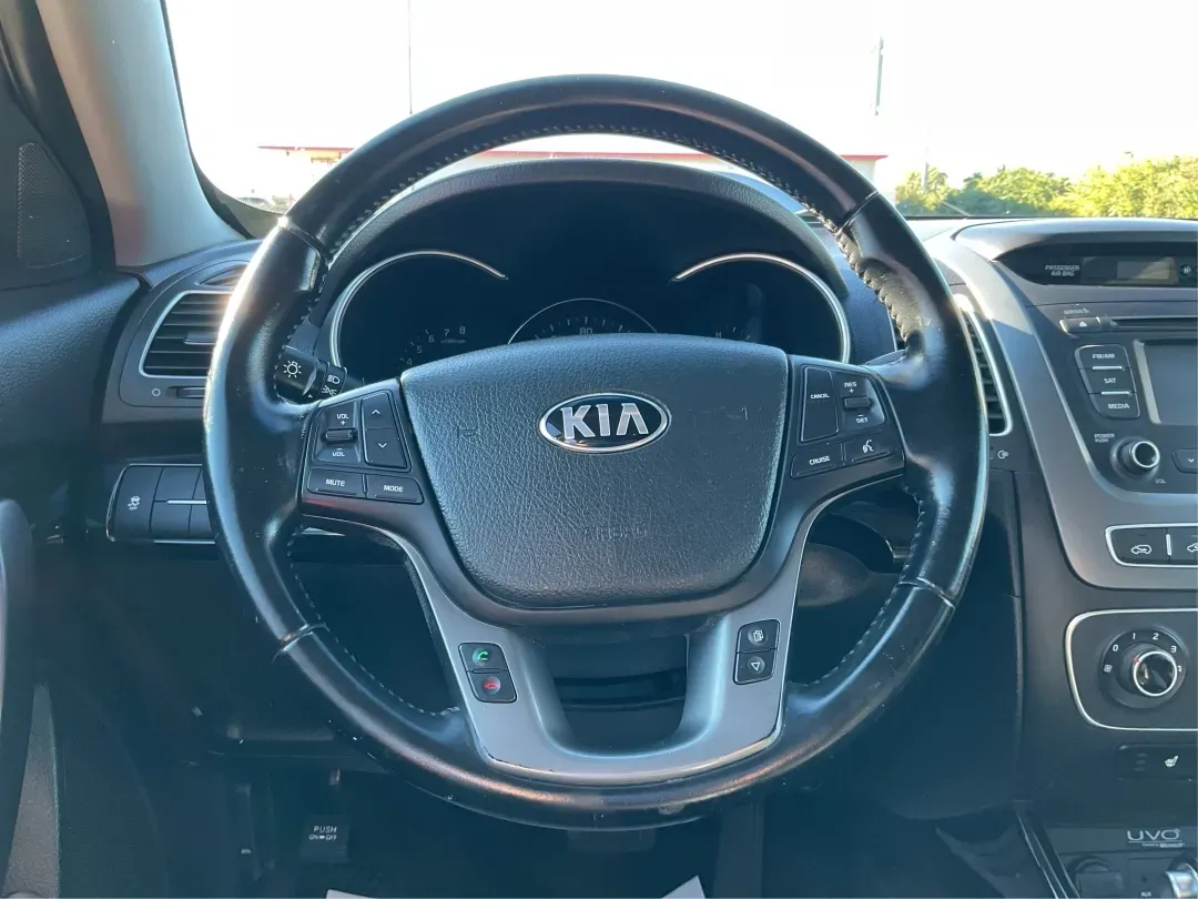 2015 Kia Sorento LX (5XYKTCA66FG) with an 2.4L I-4 gasoline direct injection engine, located at 1951 S Dayton Lakeview Rd., New Carlisle, OH, 45344, (937) 908-9800, 39.890999, -84.050255 - **Adventure Awaits with the 2015 Kia Sorento LX from Advantage Car and Credit!**<br /> <br /> Are you ready to elevate your family outings or embark on unforgettable weekend adventures? Look no further than this stunning **2015 Kia Sorento LX**! With its striking Remington Red Metallic exterior and - Photo#16