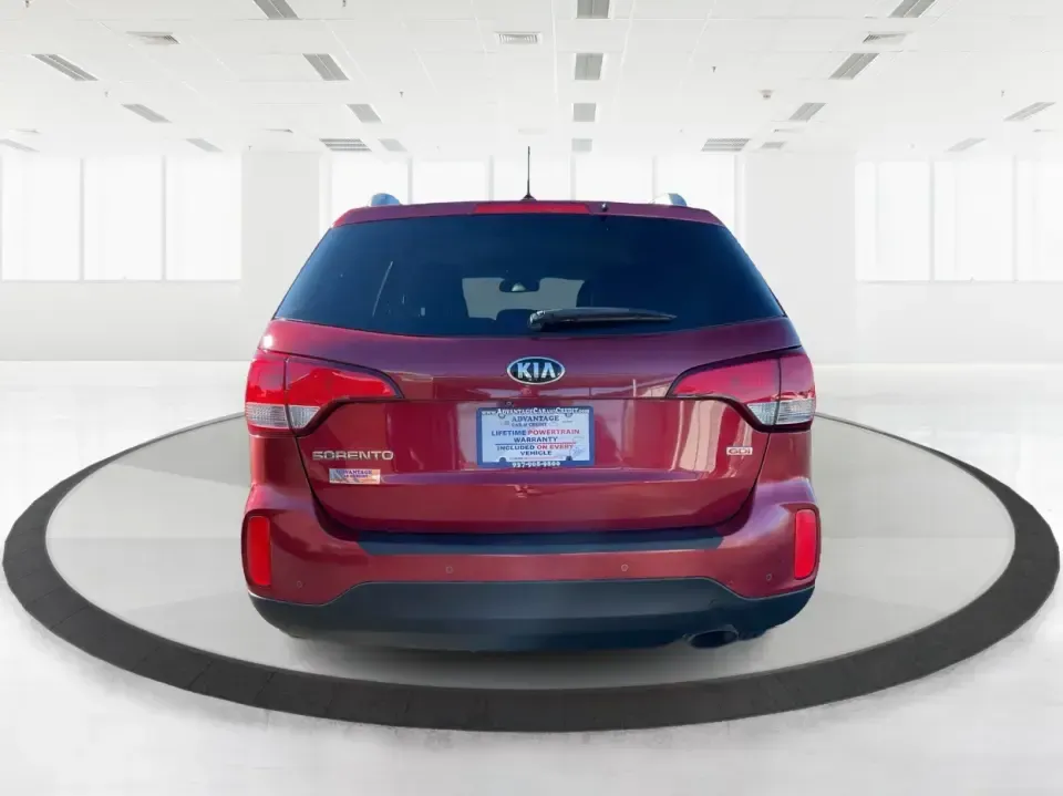 2015 Kia Sorento LX (5XYKTCA66FG) with an 2.4L I-4 gasoline direct injection engine, 6-Speed Automatic transmission, located at 8750 N County Rd 25A, Piqua, OH, 45356, (937) 908-9800, 40.164391, -84.232513 - **Adventure Awaits with the 2015 Kia Sorento LX from Advantage Car and Credit!**<br /> <br /> Are you ready to elevate your family outings or embark on unforgettable weekend adventures? Look no further than this stunning **2015 Kia Sorento LX**! With its striking Remington Red Metallic exterior and - Photo#3