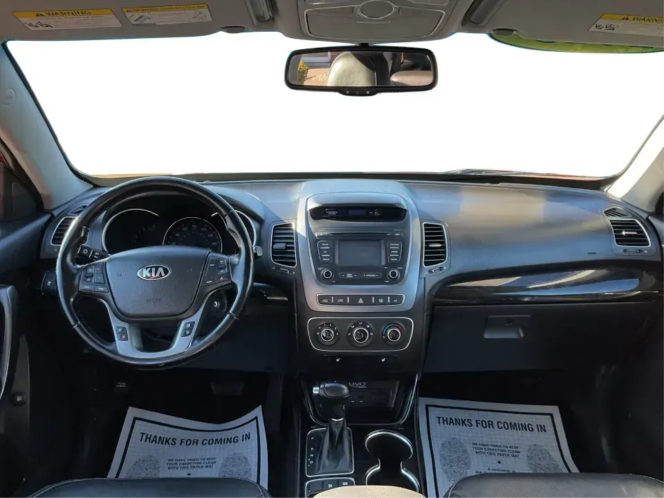 2015 Kia Sorento LX (5XYKTCA66FG) with an 2.4L I-4 gasoline direct injection engine, 6-Speed Automatic transmission, located at 8750 N County Rd 25A, Piqua, OH, 45356, (937) 908-9800, 40.164391, -84.232513 - **Adventure Awaits with the 2015 Kia Sorento LX from Advantage Car and Credit!**<br /> <br /> Are you ready to elevate your family outings or embark on unforgettable weekend adventures? Look no further than this stunning **2015 Kia Sorento LX**! With its striking Remington Red Metallic exterior and - Photo#19