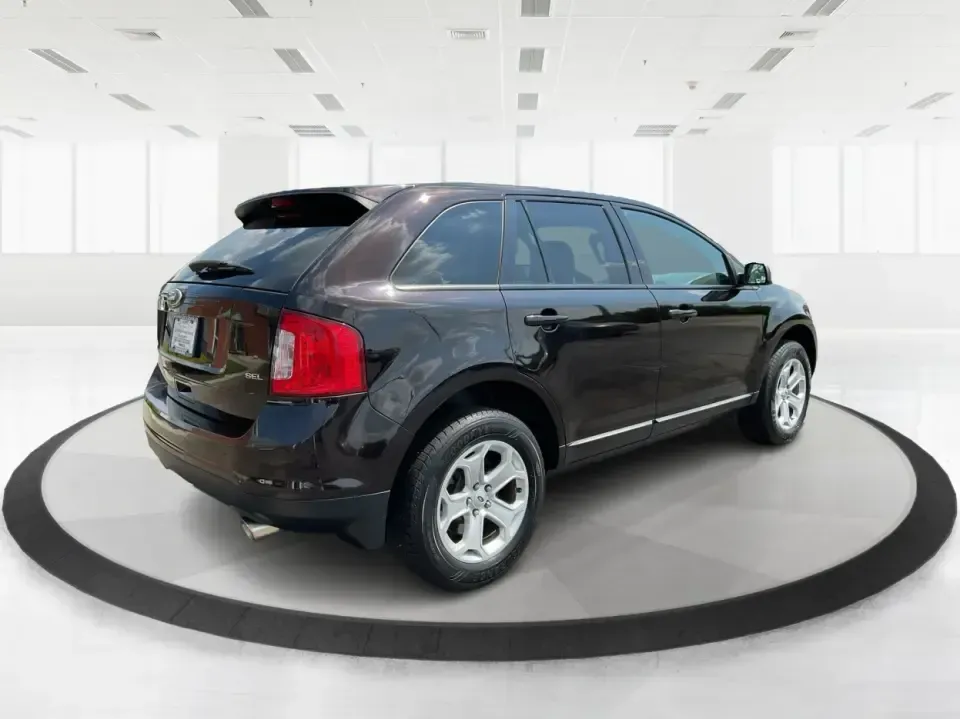 2013 Ford Edge SEL (2FMDK3JC0DB) with an 3.5L V6 DOHC 24V engine, 6-Speed Automatic transmission, located at 880 E. National Road, Vandalia, OH, 45377, (937) 908-9800, 39.891918, -84.183594 - **Explore New Horizons with the 2013 Ford Edge SEL Your Adventure Awaits!**<br /> <br /> Are you ready to elevate your daily commute or embark on weekend adventures with friends and family? The 2013 Ford Edge SEL is the versatile SUV that perfectly balances style, comfort, and capability, making it - Photo#2