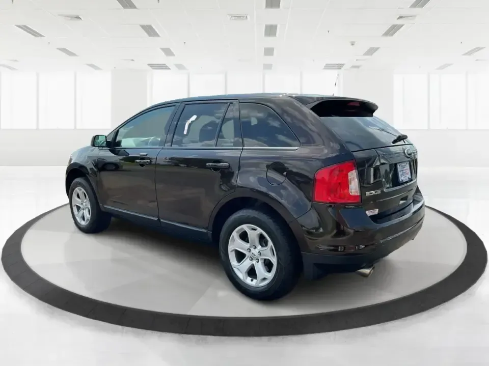 2013 Ford Edge SEL (2FMDK3JC0DB) with an 3.5L V6 DOHC 24V engine, 6-Speed Automatic transmission, located at 880 E. National Road, Vandalia, OH, 45377, (937) 908-9800, 39.891918, -84.183594 - **Explore New Horizons with the 2013 Ford Edge SEL Your Adventure Awaits!**<br /> <br /> Are you ready to elevate your daily commute or embark on weekend adventures with friends and family? The 2013 Ford Edge SEL is the versatile SUV that perfectly balances style, comfort, and capability, making it - Photo#4