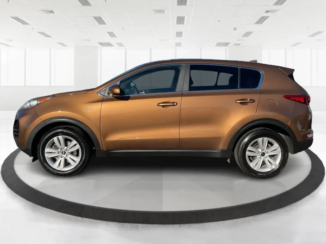 2017 Kia Sportage LX (KNDPMCAC2H7) with an Theta II 2.4L I-4 gasoline direct injection engine, located at 401 Woodman Dr, Riverside, OH, 45431, (937) 908-9800, 39.760899, -84.123421 - **Discover Your Next Adventure with the 2017 Kia Sportage LX at Advantage Car and Credit Riverside!**<br /> <br /> Looking for a reliable vehicle that perfectly balances comfort, style, and performance for your next family road trip or daily commute? The 2017 Kia Sportage LX is more than just a cro - Photo#5