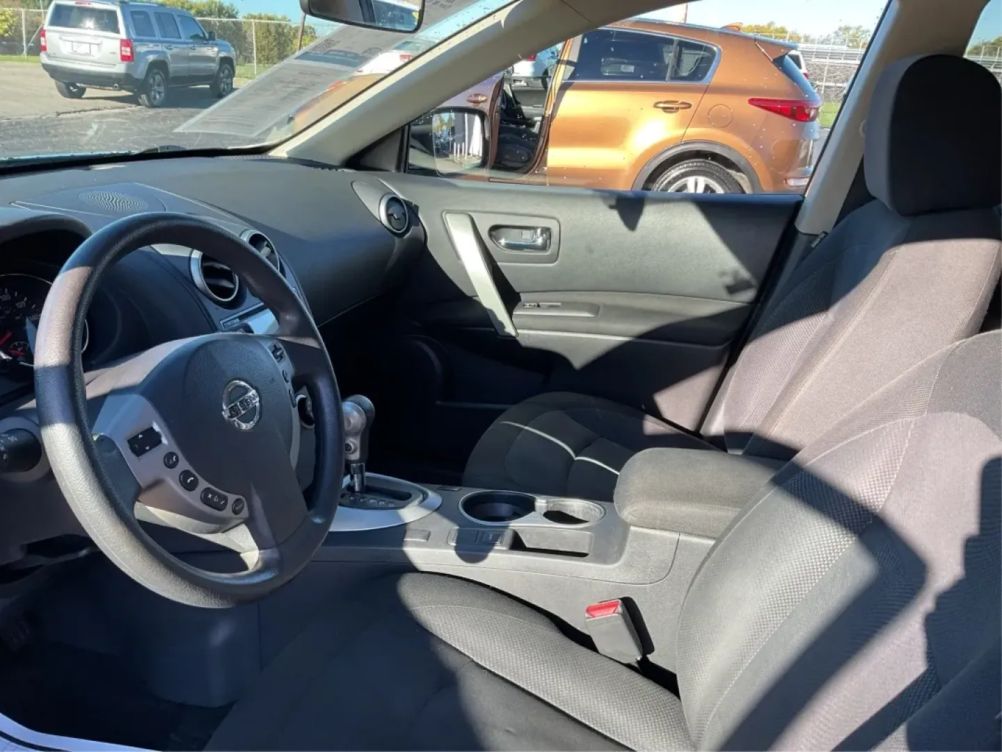 2015 Nissan Rogue S (JN8AS5MV2FW) with an 2.5L I-4 DOHC engine, located at 1099 N County Rd 25A , Troy, OH, 45373, (937) 908-9800, 40.057079, -84.212883 - Are you ready to elevate your daily commute or embark on spontaneous weekend getaways? The 2015 Nissan Rogue, available at Advantage Car and Credit in Troy, OH, is the perfect SUV for those who crave versatility and style. With its all-wheel drive and spacious interior, this vehicle is not just a mo - Photo#9