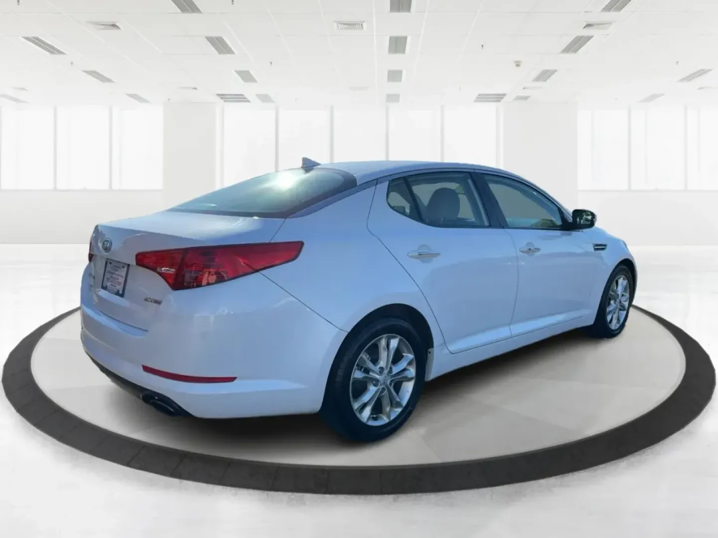 2012 Kia Optima EX (5XXGN4A70CG) with an 2.4L I-4 gasoline direct injection engine, located at 1099 N County Rd 25A , Troy, OH, 45373, (937) 908-9800, 40.057079, -84.212883 - Elevate your driving experience with this stunning 2012 Kia Optima EX, a perfect blend of style, comfort, and reliability. Ideal for budget-conscious buyers and growing families alike, this sedan is designed to meet your daily commuting needs while offering the space and features essential for both - Photo#2