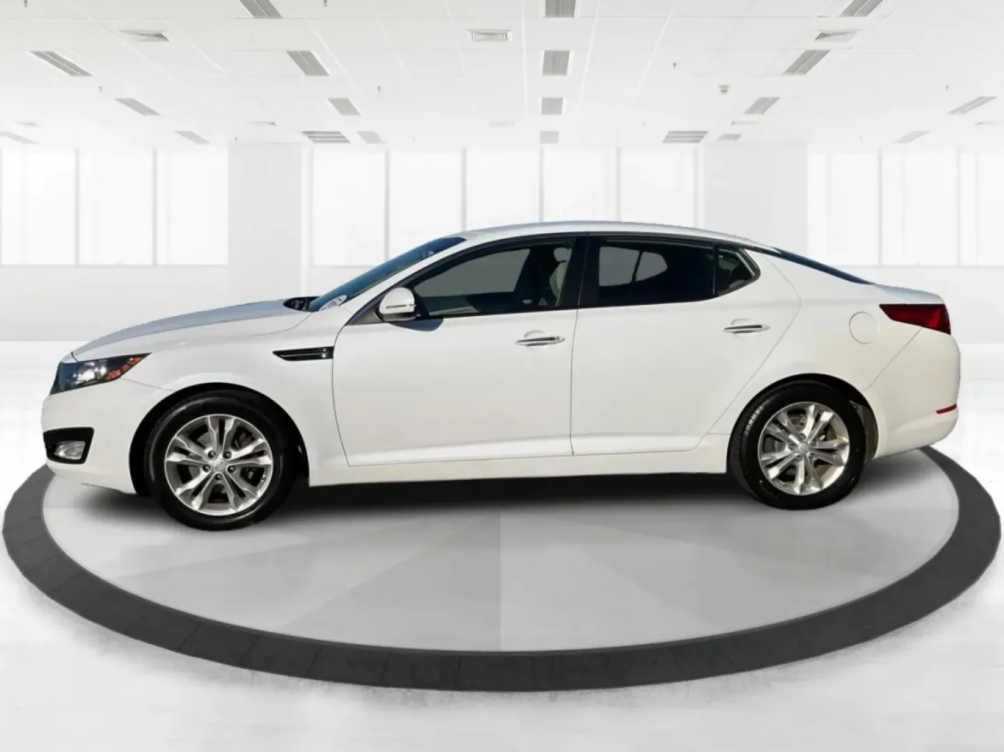 2012 Kia Optima EX (5XXGN4A70CG) with an 2.4L I-4 gasoline direct injection engine, located at 1099 N County Rd 25A , Troy, OH, 45373, (937) 908-9800, 40.057079, -84.212883 - Elevate your driving experience with this stunning 2012 Kia Optima EX, a perfect blend of style, comfort, and reliability. Ideal for budget-conscious buyers and growing families alike, this sedan is designed to meet your daily commuting needs while offering the space and features essential for both - Photo#5