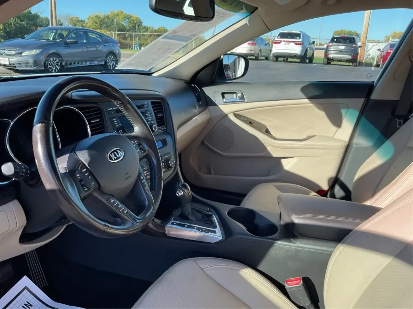 2012 Kia Optima EX (5XXGN4A70CG) with an 2.4L I-4 gasoline direct injection engine, located at 1099 N County Rd 25A , Troy, OH, 45373, (937) 908-9800, 40.057079, -84.212883 - Elevate your driving experience with this stunning 2012 Kia Optima EX, a perfect blend of style, comfort, and reliability. Ideal for budget-conscious buyers and growing families alike, this sedan is designed to meet your daily commuting needs while offering the space and features essential for both - Photo#9