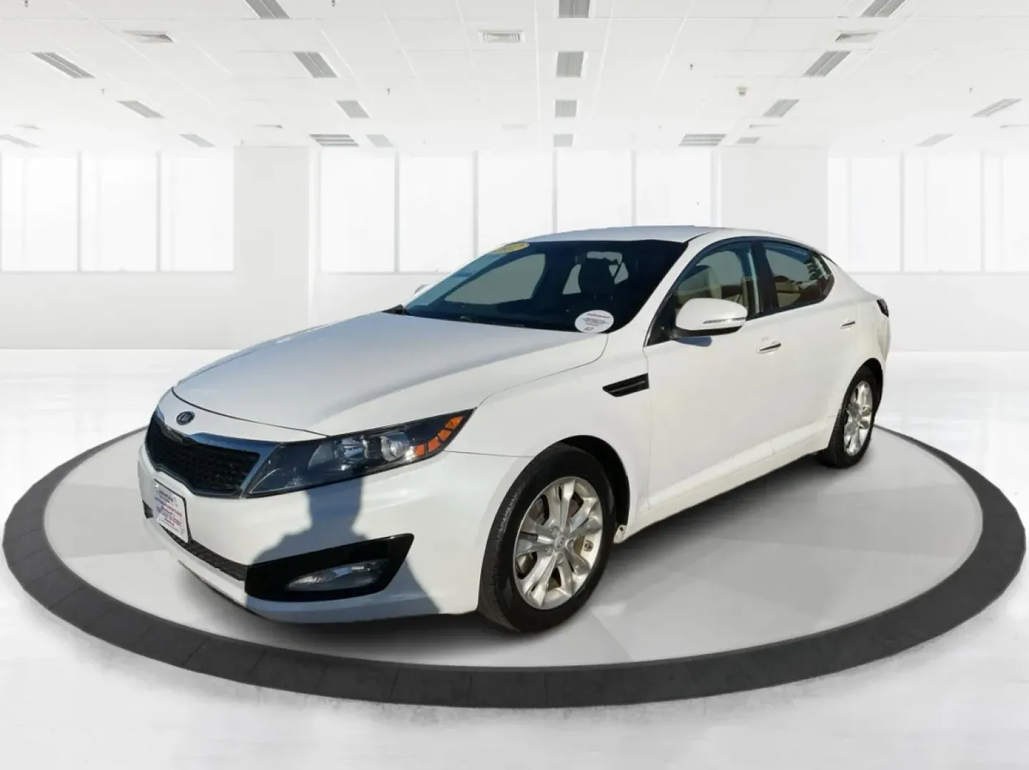 2012 Kia Optima EX (5XXGN4A70CG) with an 2.4L I-4 gasoline direct injection engine, located at 1951 S Dayton Lakeview Rd., New Carlisle, OH, 45344, (937) 908-9800, 39.890999, -84.050255 - Elevate your driving experience with this stunning 2012 Kia Optima EX, a perfect blend of style, comfort, and reliability. Ideal for budget-conscious buyers and growing families alike, this sedan is designed to meet your daily commuting needs while offering the space and features essential for both - Photo#8