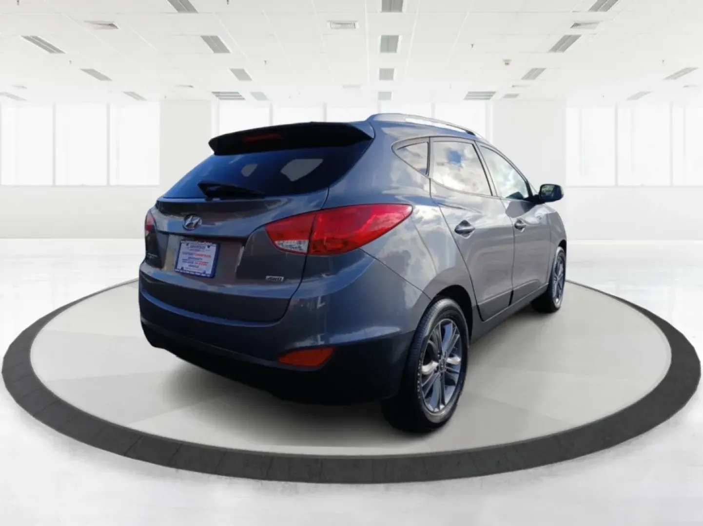 2014 Hyundai Tucson GLS AWD (KM8JUCAG3EU) with an 2.4L L4 DOHC 16V engine, 6-Speed Automatic transmission, located at 1230 East Main St, Xenia, OH, 45385, (937) 908-9800, 39.688026, -83.910172 - **Explore the Great Outdoors with the 2014 Hyundai Tucson GLS AWD! Perfect for Weekend Adventures!**<br /> <br /> If you're ready to embrace life's adventures, the 2014 Hyundai Tucson GLS AWD is the SUV you need. Whether you're planning a weekend camping trip, daily commutes around Fairborn, or shut - Photo#2