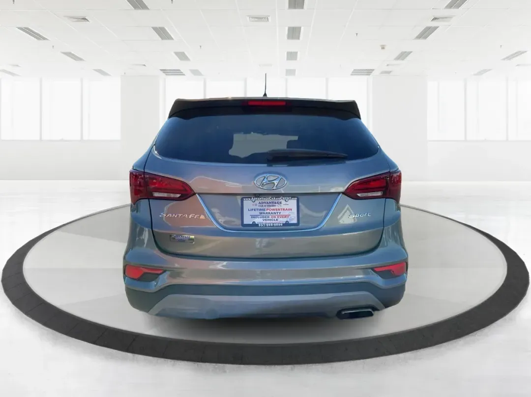 2018 Hyundai Santa Fe 2.4L (5XYZT3LB6JG) with an Theta II 2.4L I-4 gasoline direct injection engine, located at 4508 South Dixie Dr, Moraine, OH, 45439, (937) 908-9800, 39.689976, -84.218452 - Elevate your family adventures and daily commutes with the remarkable 2018 Hyundai Santa Fe, now available at Advantage Car and Credit - Moraine. This SUV is designed to seamlessly fit into your lifestyle, whether you're navigating busy streets, embarking on weekend getaways, or tackling the challen - Photo#3